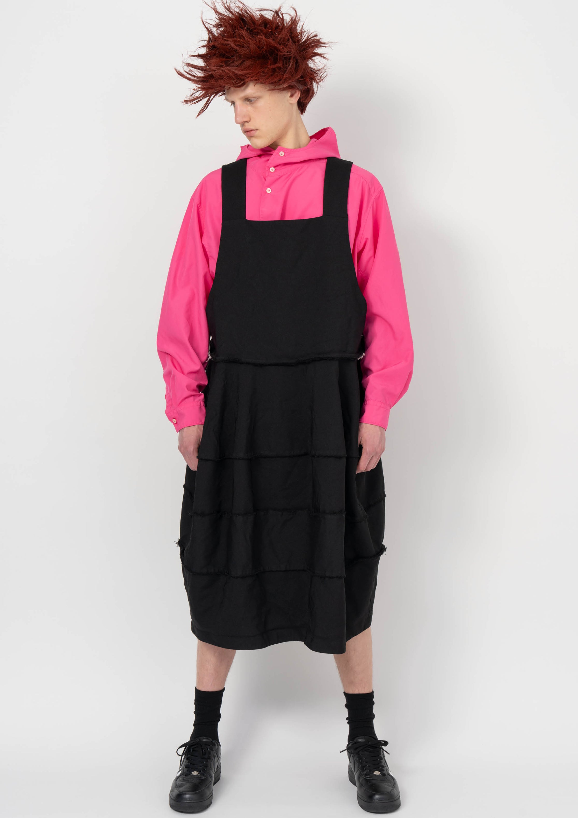 Fashion model wearing a BLACK COMME DES GARÇONS AW26 outfit