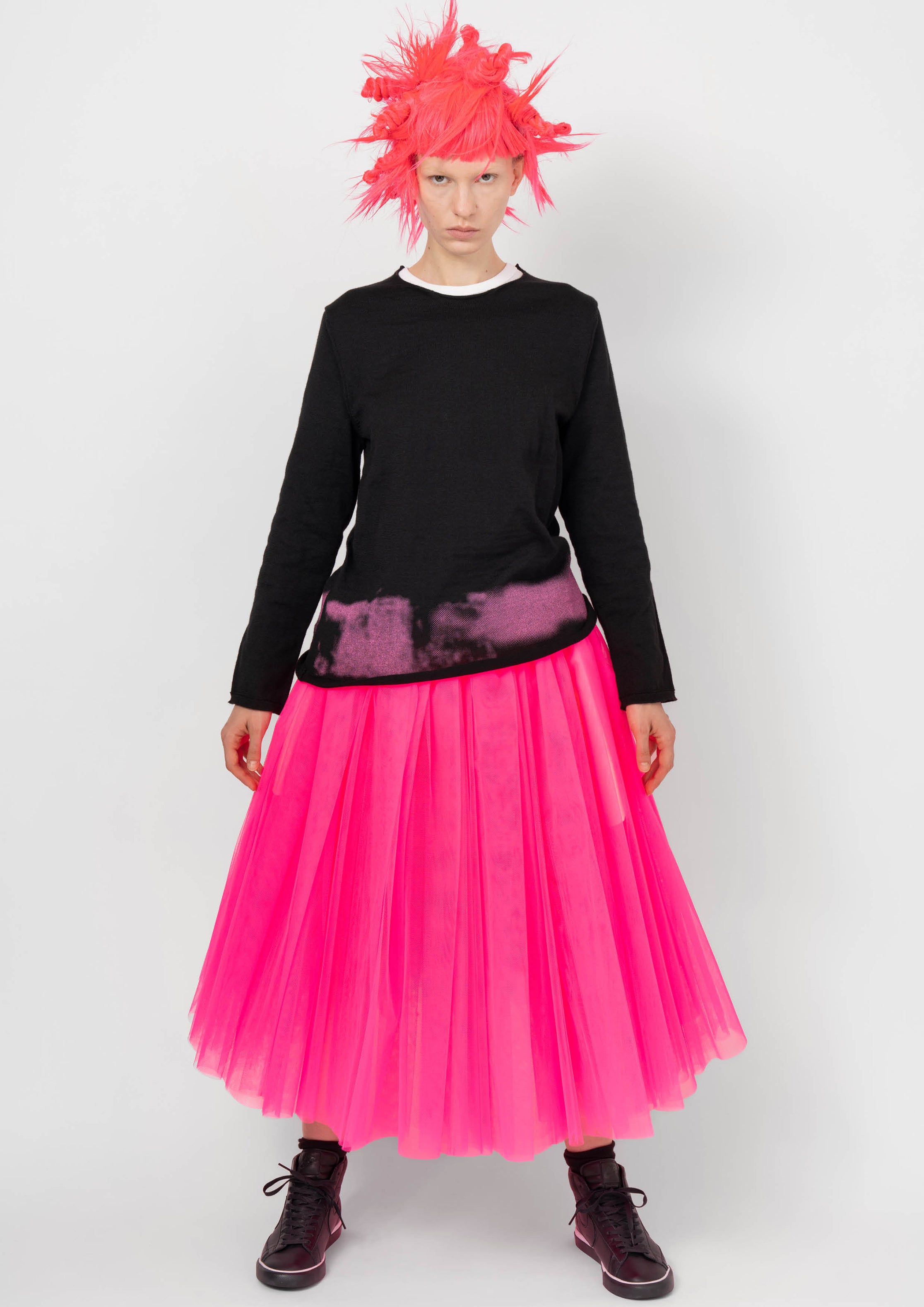 Fashion model wearing a BLACK COMME DES GARÇONS AW26 outfit