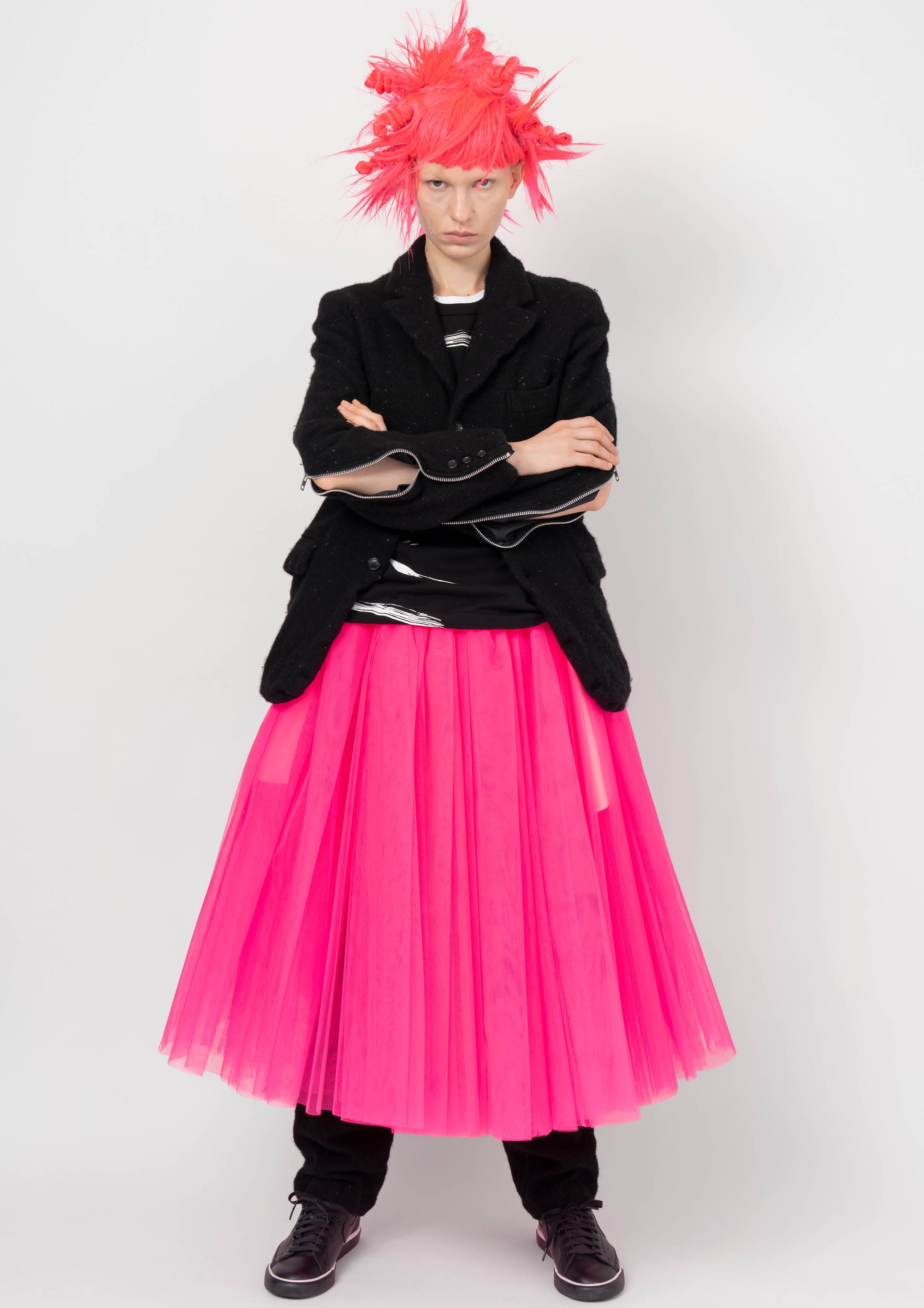 Fashion model wearing a BLACK COMME DES GARÇONS AW26 outfit