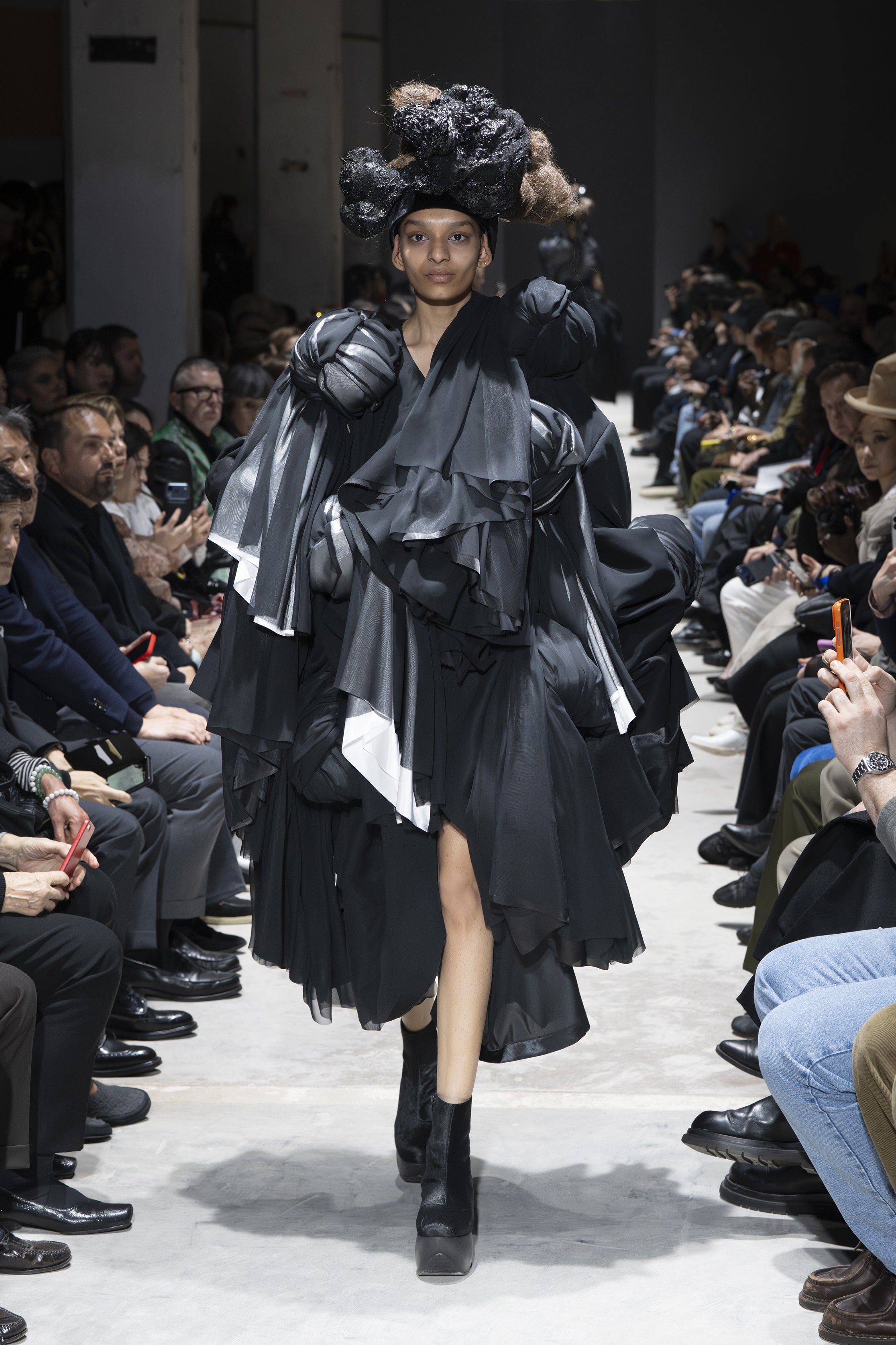Fashion model wearing a Comme des Garçons AW26 outfit