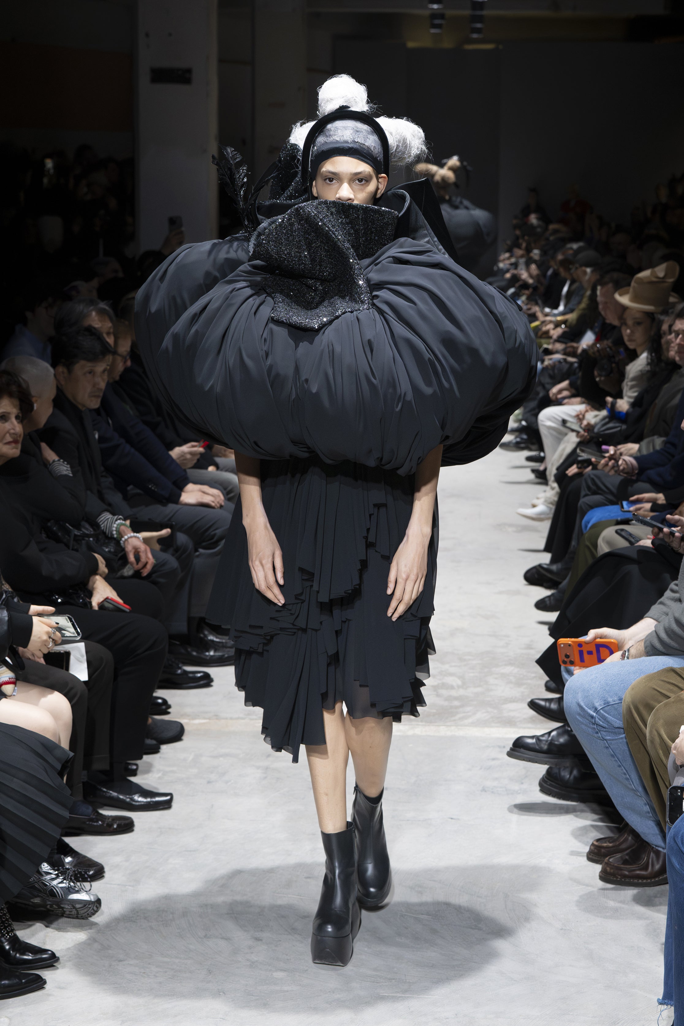 Fashion model wearing a Comme des Garçons AW26 outfit