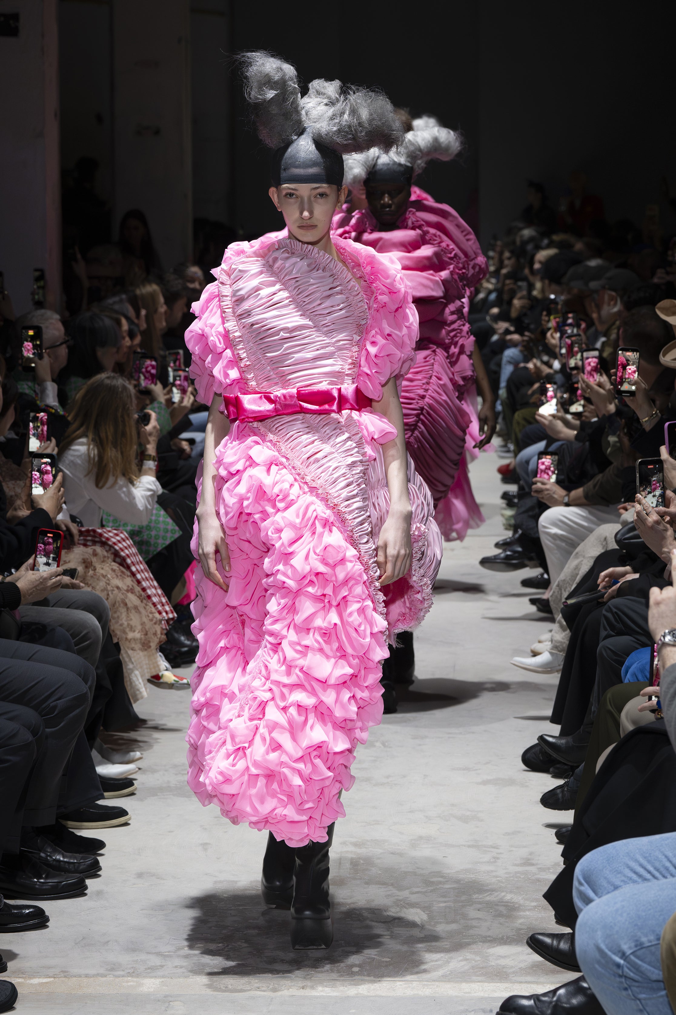 Fashion model wearing a Comme des Garçons AW26 outfit