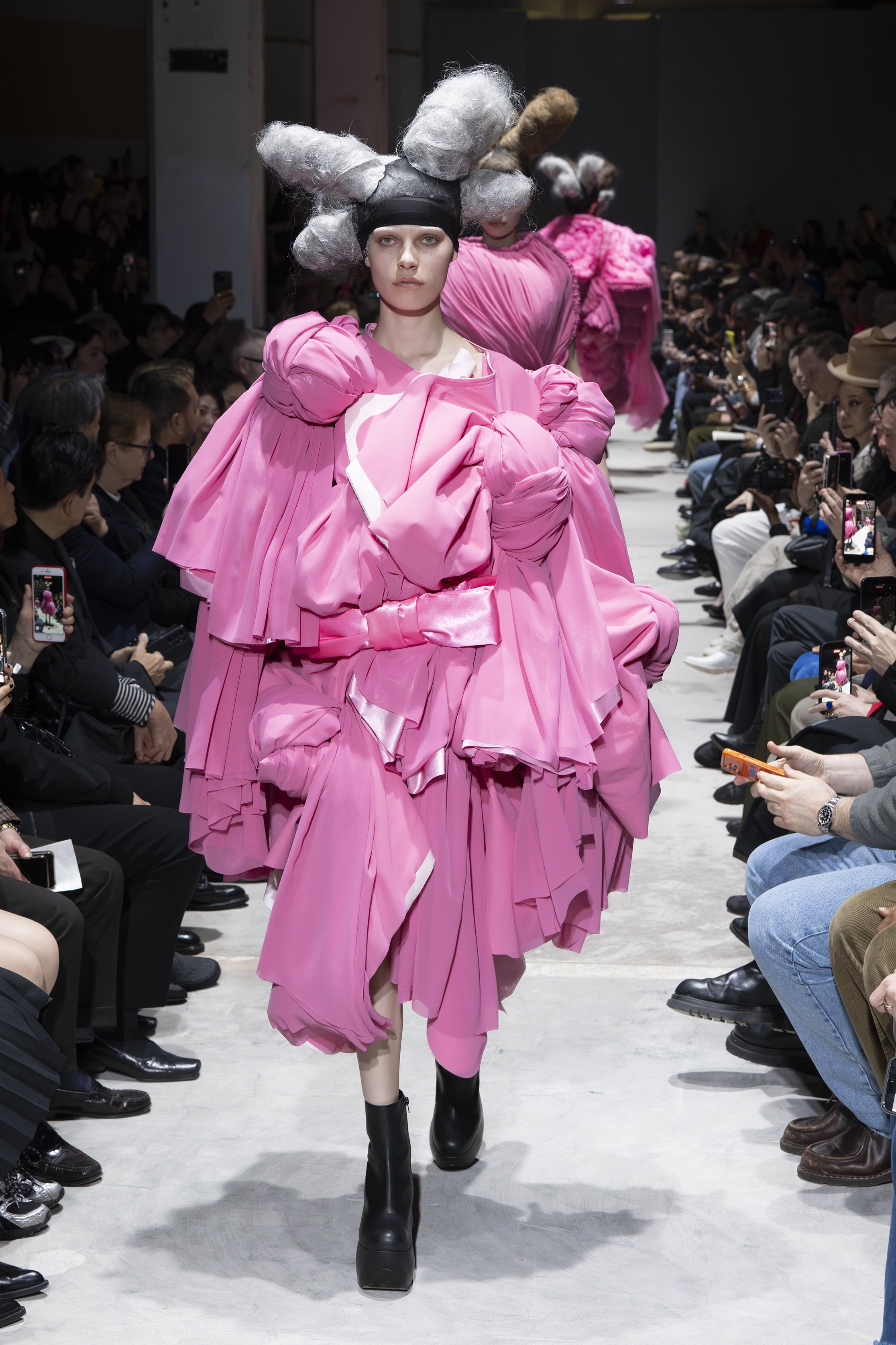 Fashion model wearing a Comme des Garçons AW26 outfit