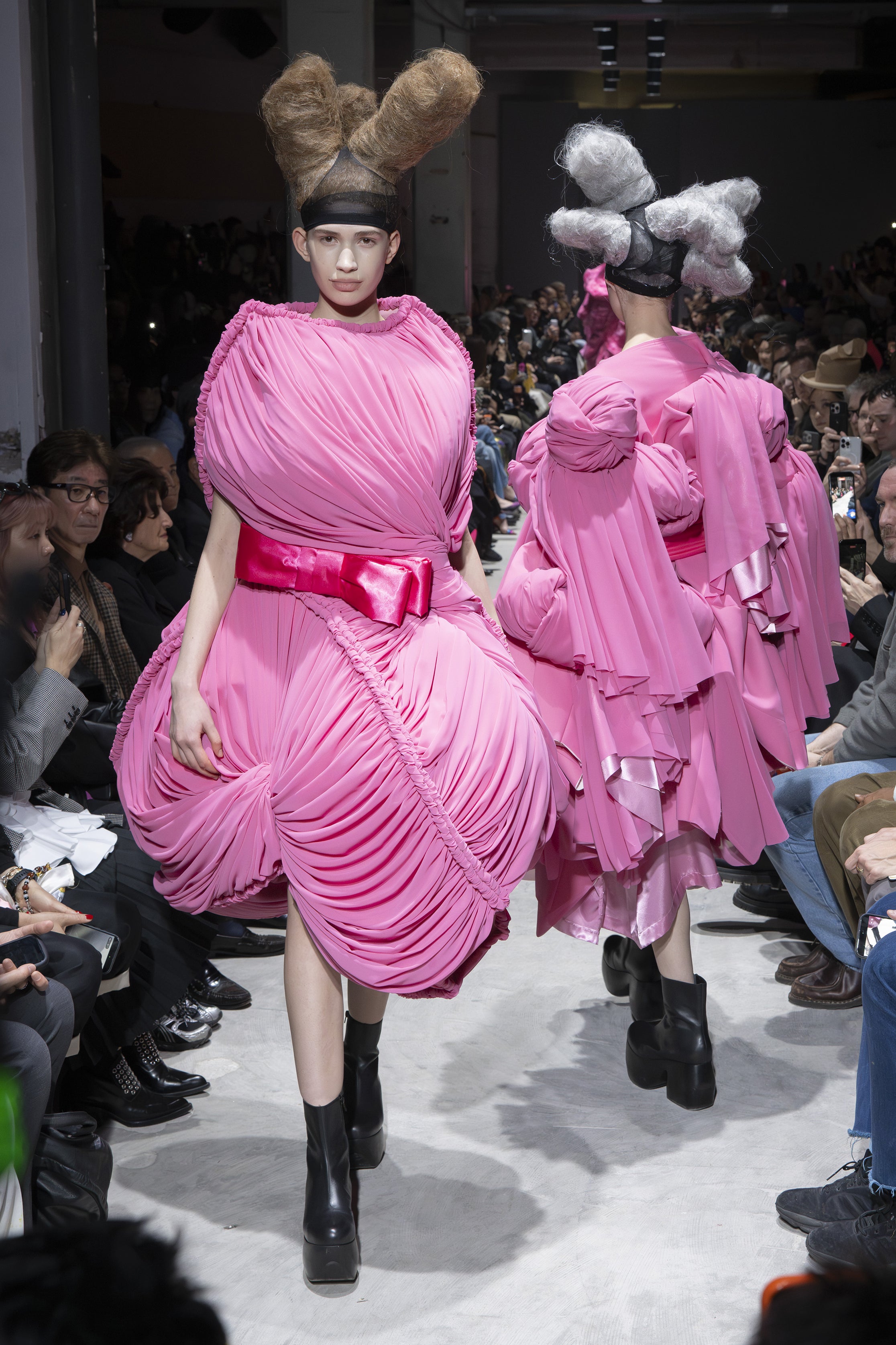 Fashion model wearing a Comme des Garçons AW26 outfit