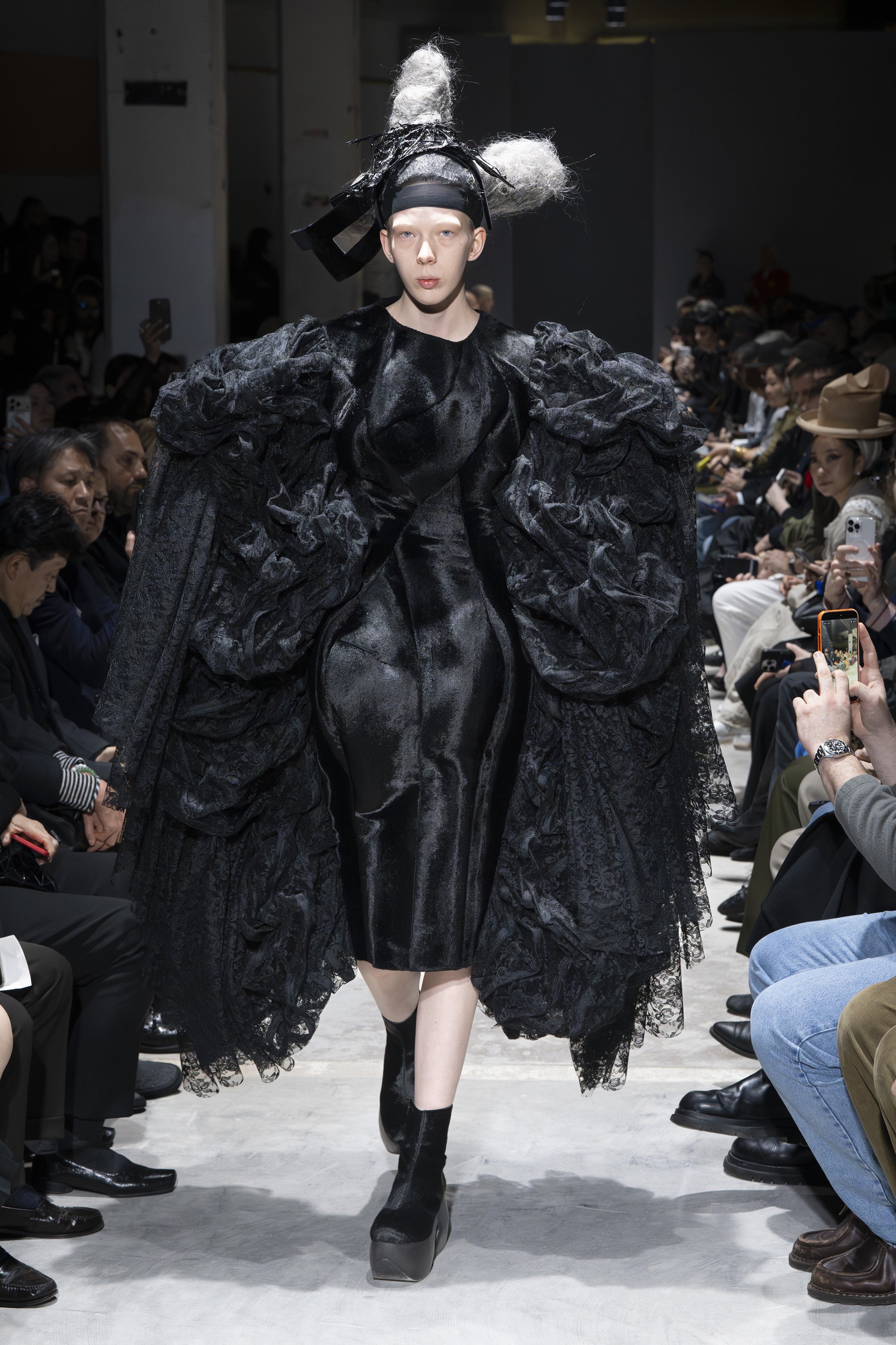 Fashion model wearing a Comme des Garçons AW26 outfit