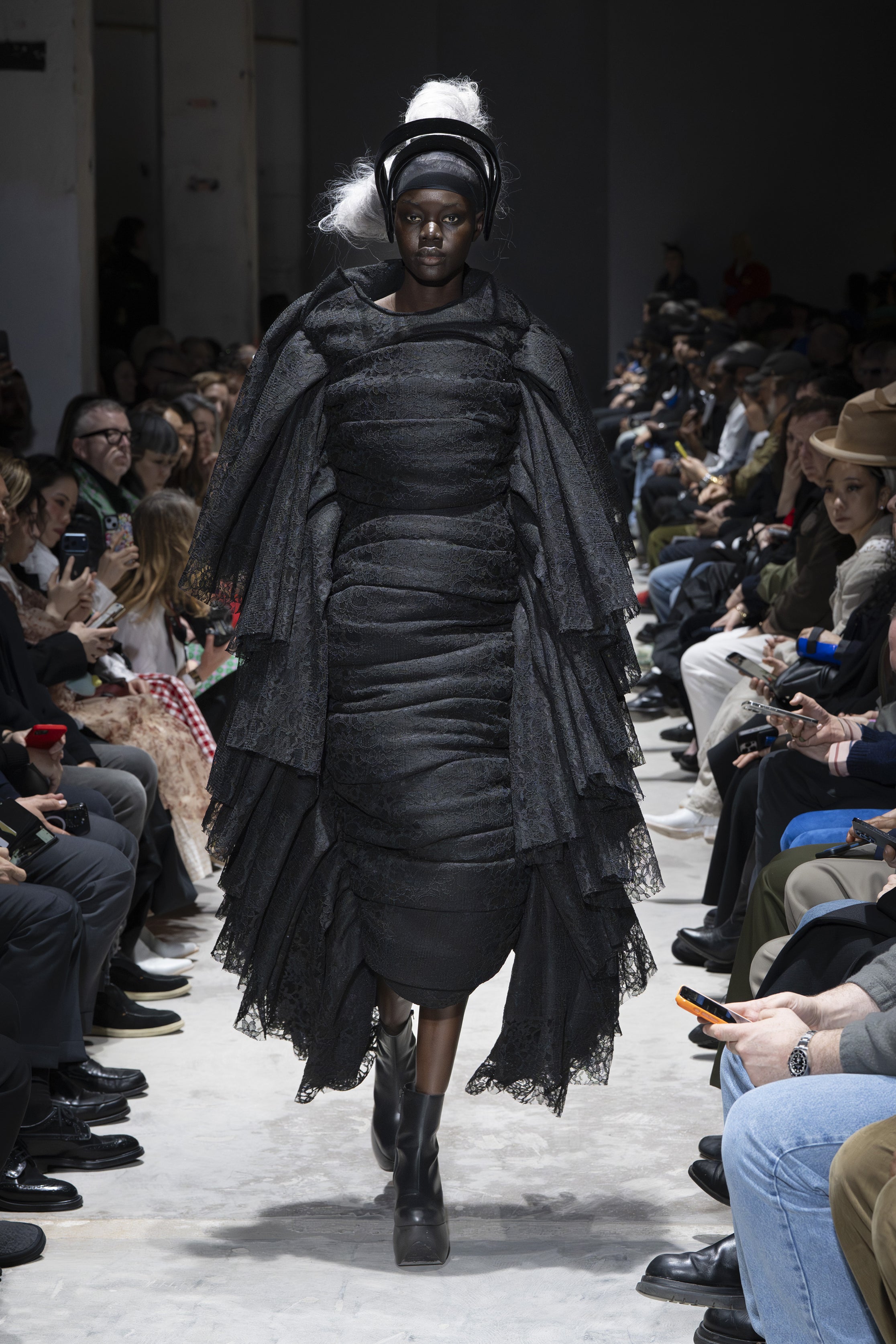 Fashion model wearing a Comme des Garçons AW26 outfit
