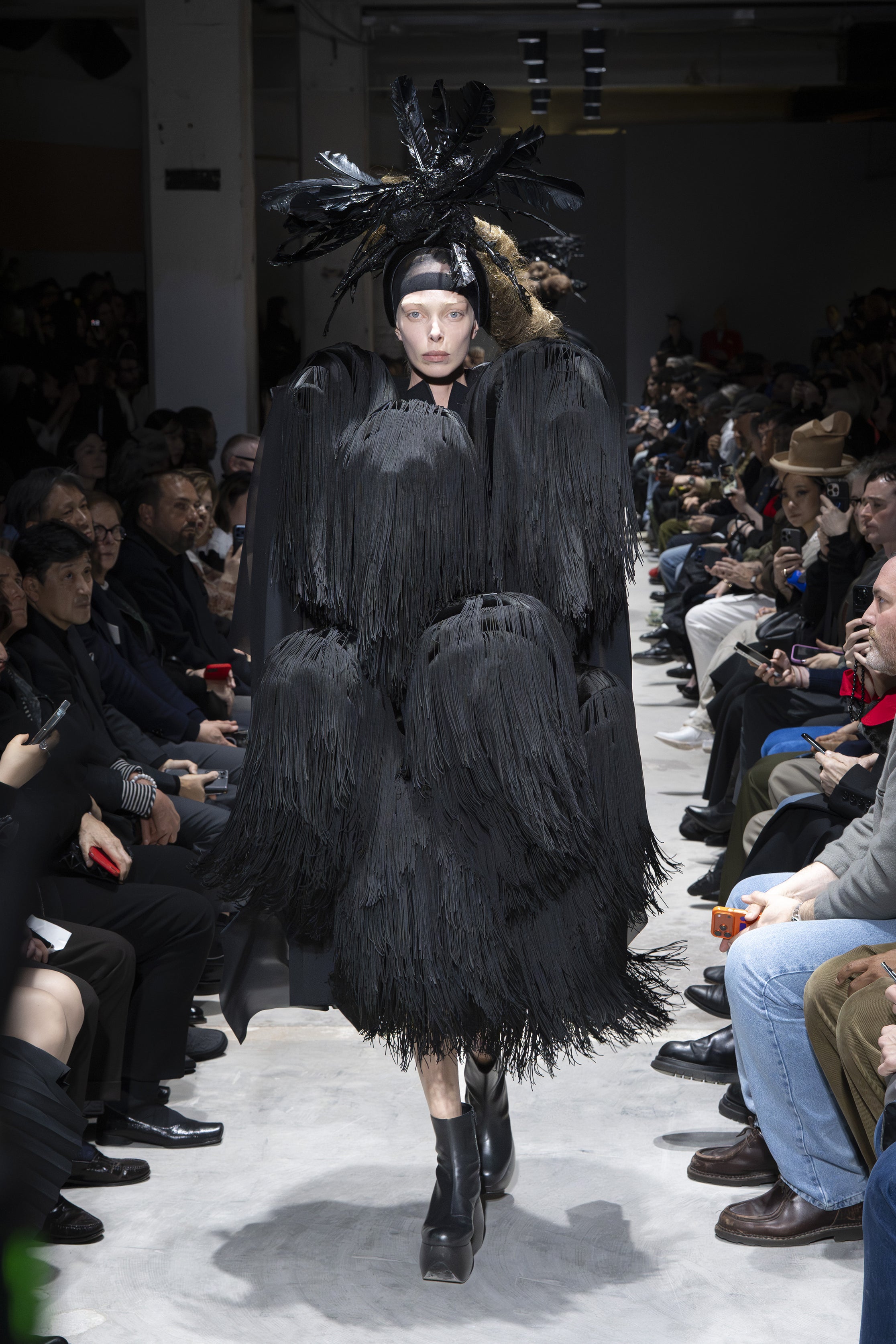 Fashion model wearing a Comme des Garçons AW26 outfit