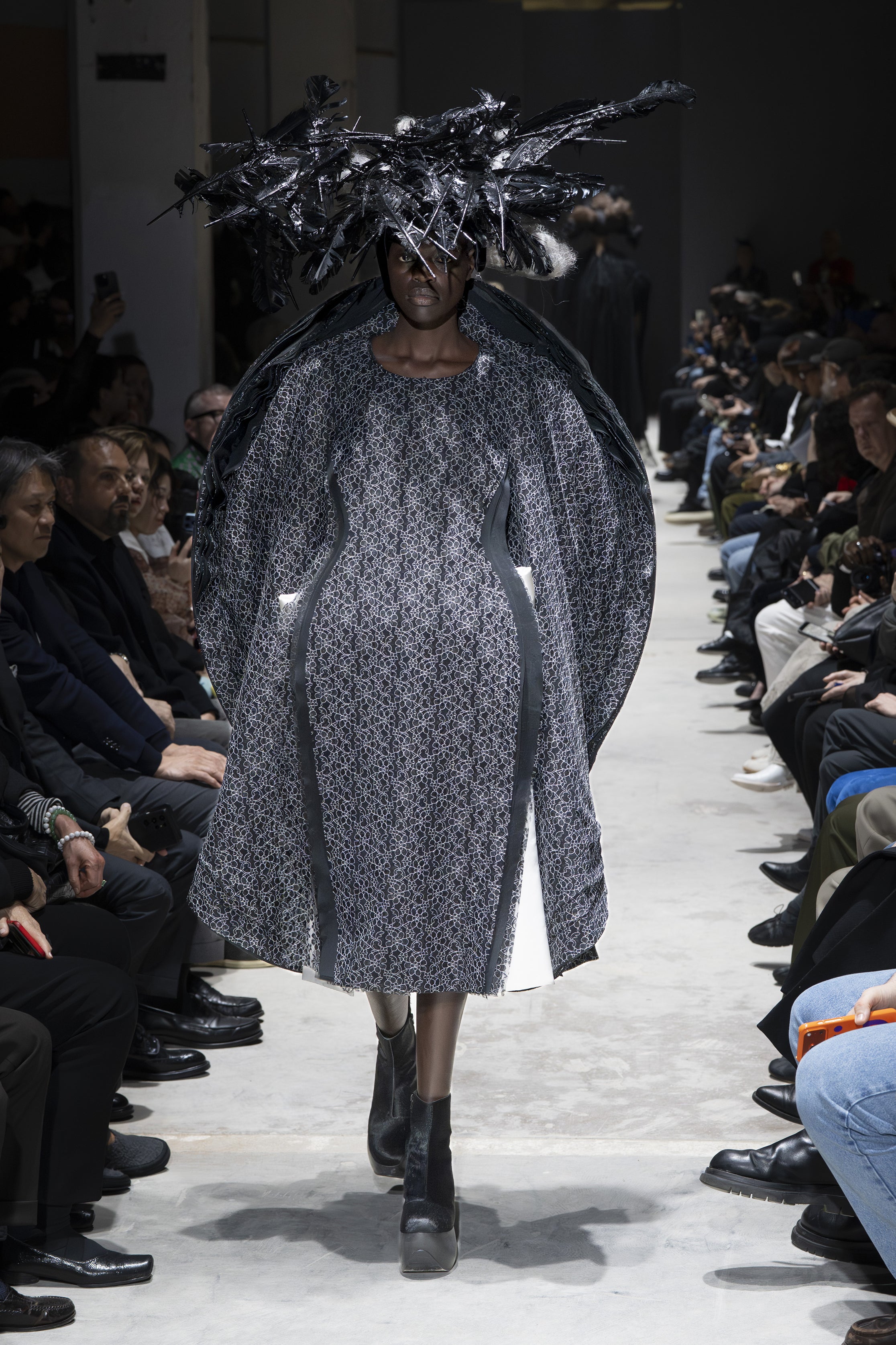 Fashion model wearing a Comme des Garçons AW26 outfit