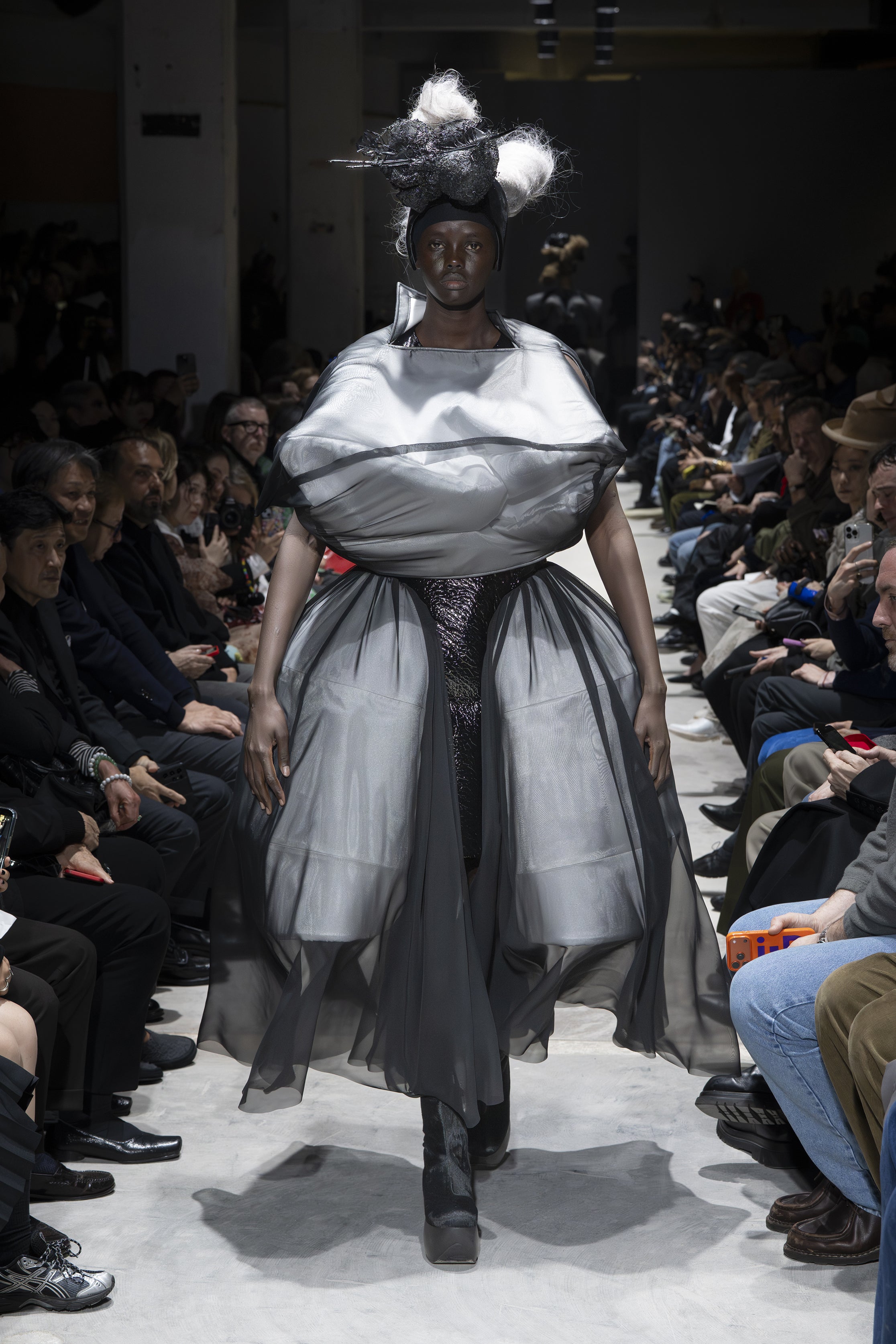 Fashion model wearing a Comme des Garçons AW26 outfit
