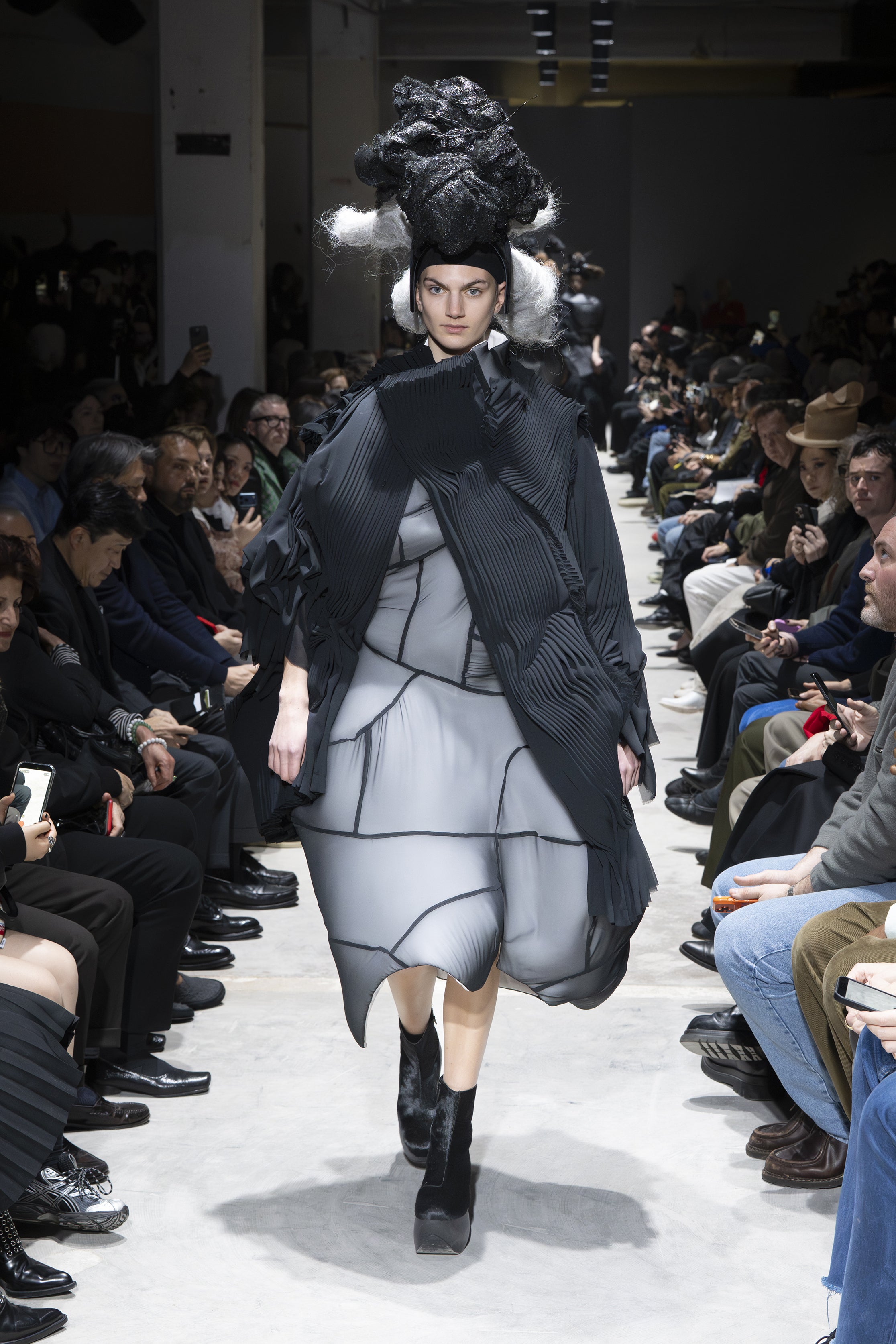 Fashion model wearing a Comme des Garçons AW26 outfit