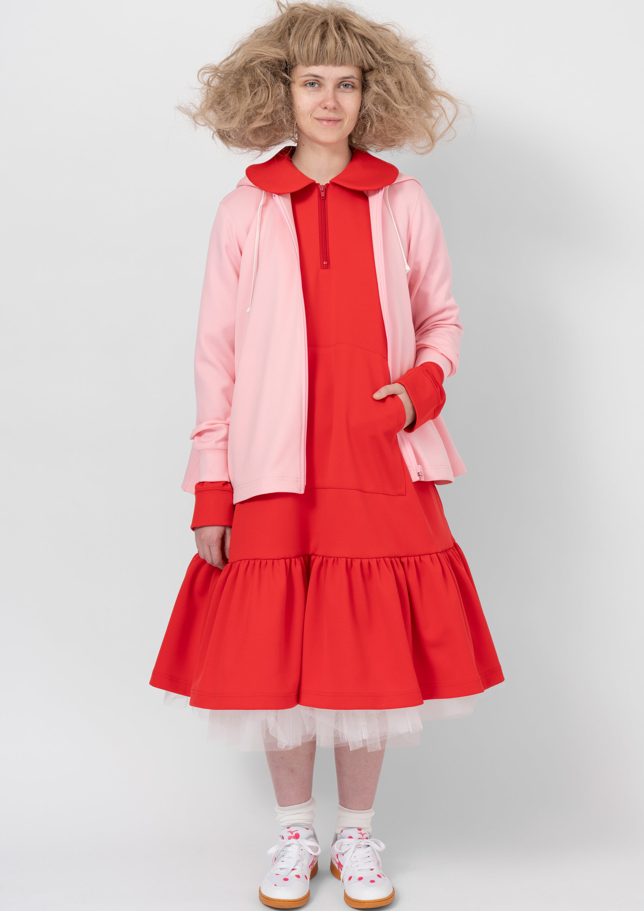 Fashion model wearing a COMME DES GARÇONS GIRL AW26 outfit