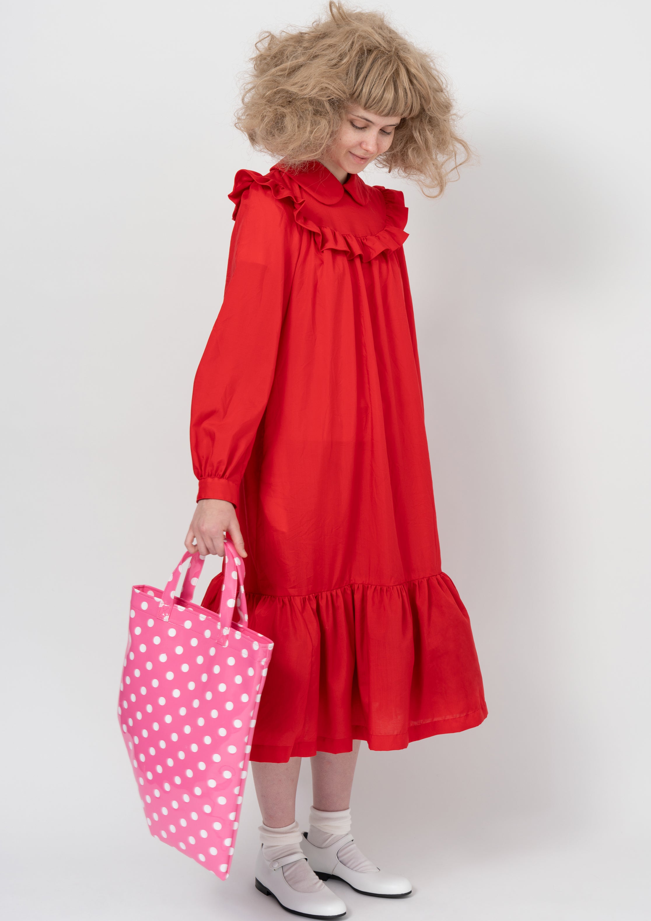 Fashion model wearing a COMME DES GARÇONS GIRL AW26 outfit
