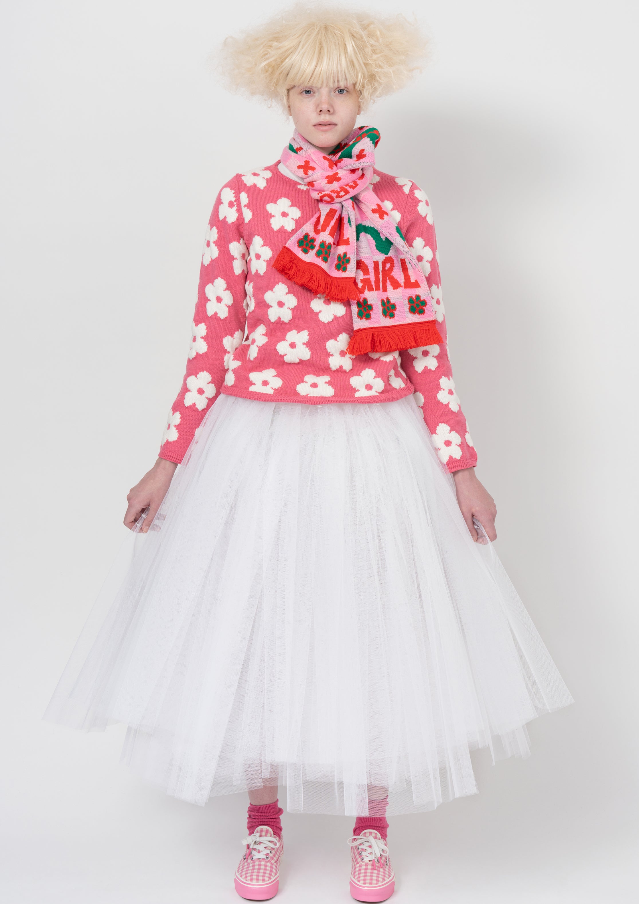 Fashion model wearing a COMME DES GARÇONS GIRL AW26 outfit