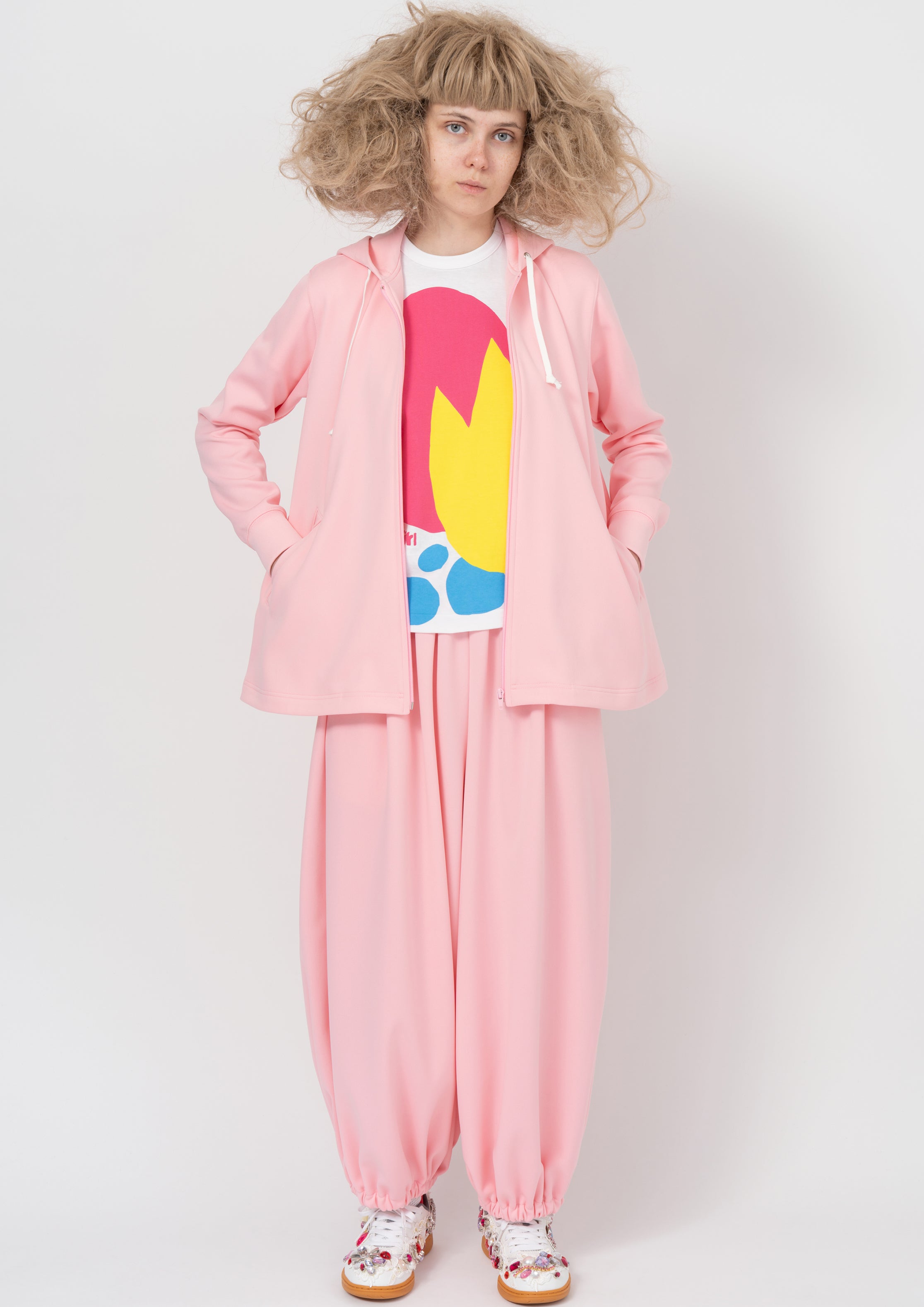 Fashion model wearing a COMME DES GARÇONS GIRL AW26 outfit