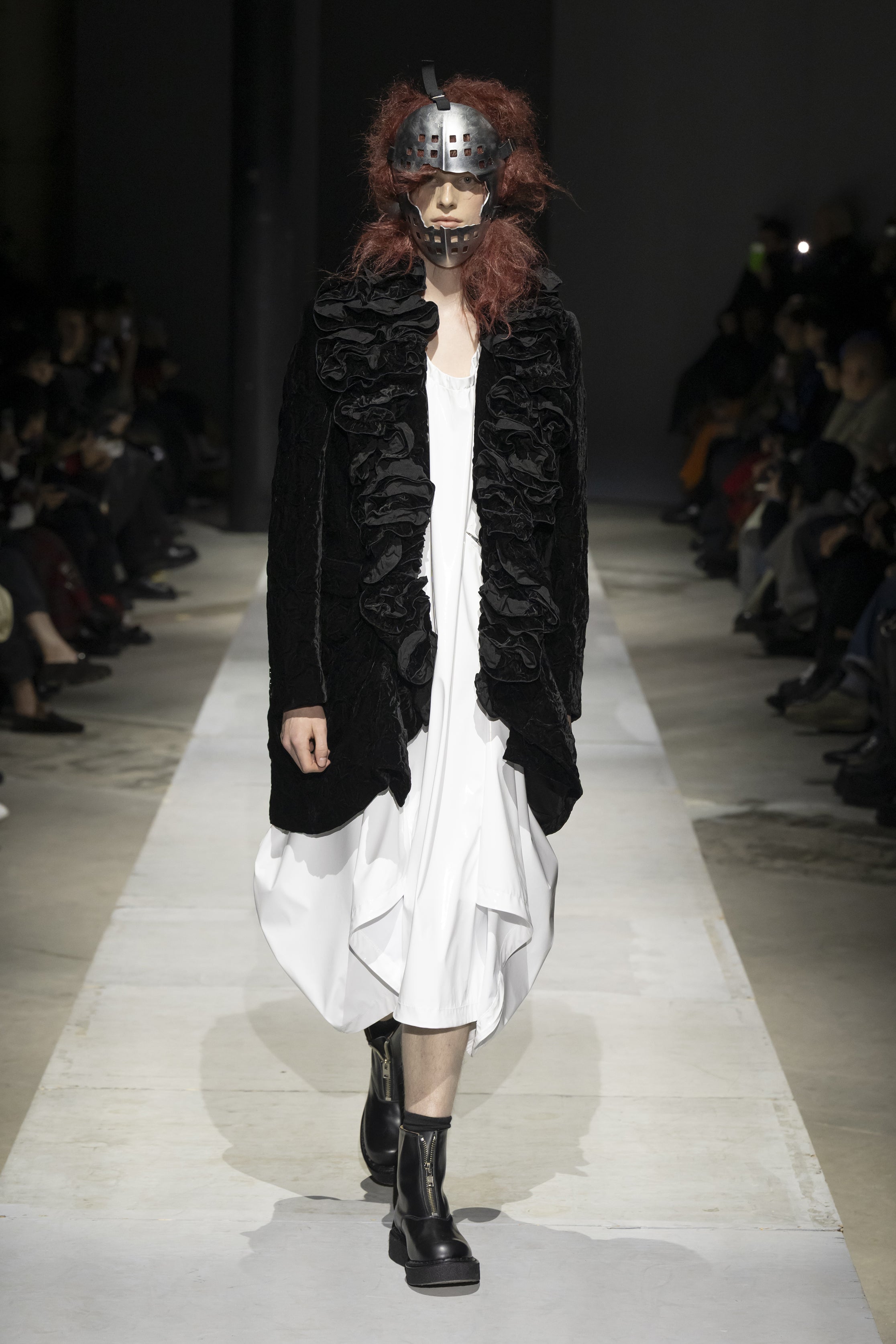 Fashion model wearing a COMME DES GARÇONS HOMME PLUS SS26 outfit