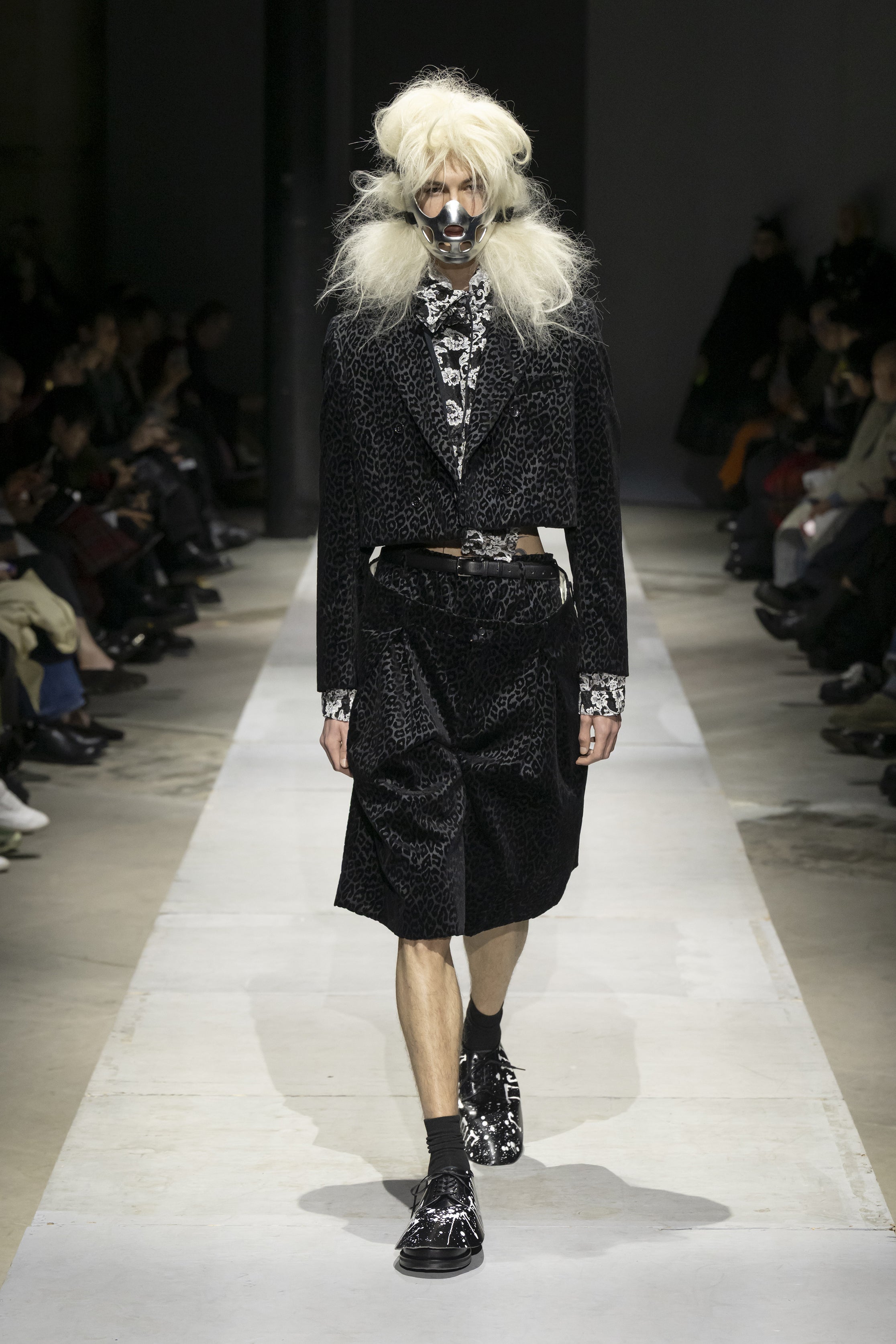 Fashion model wearing a COMME DES GARÇONS HOMME PLUS SS26 outfit