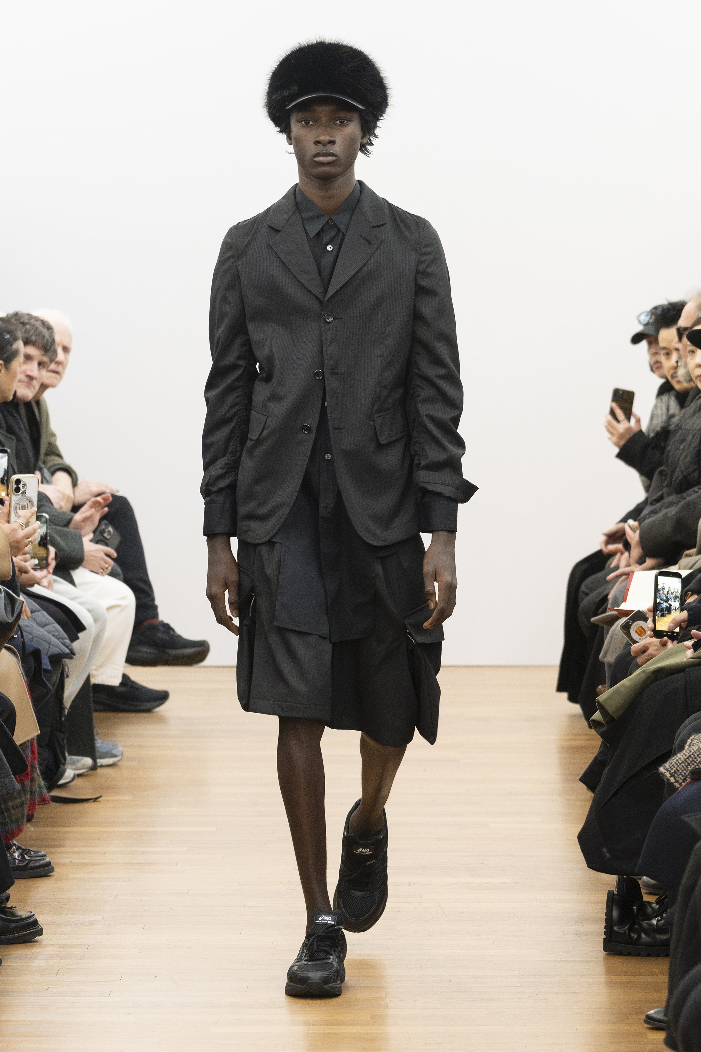 Fashion model wearing a COMME DES GARÇONS SHIRT AW26 outfit