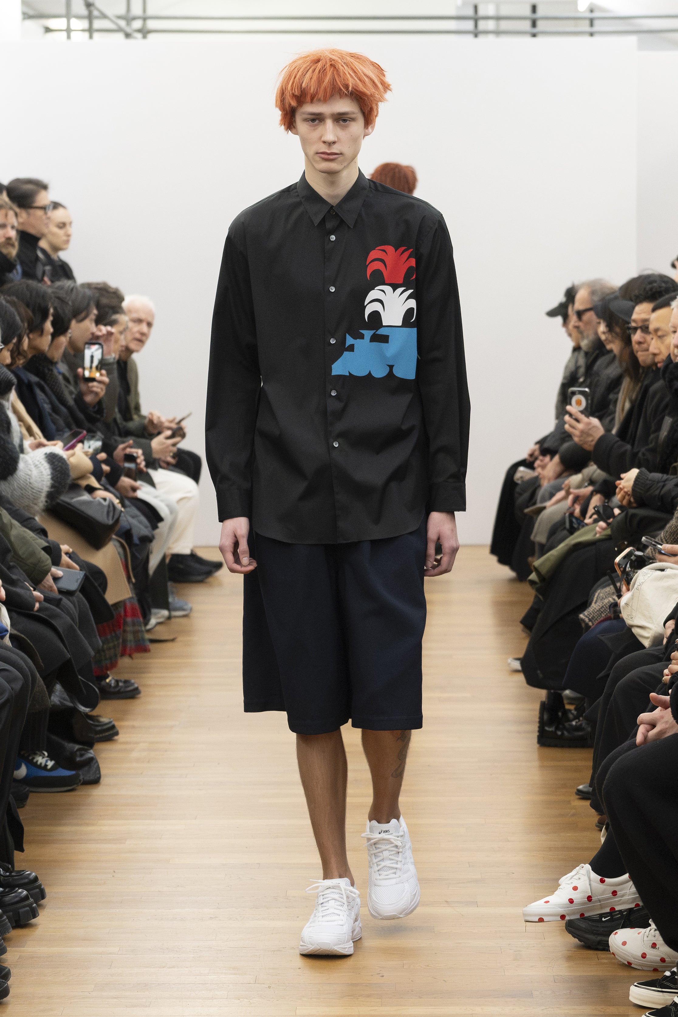 Fashion model wearing a COMME DES GARÇONS SHIRT AW26 outfit