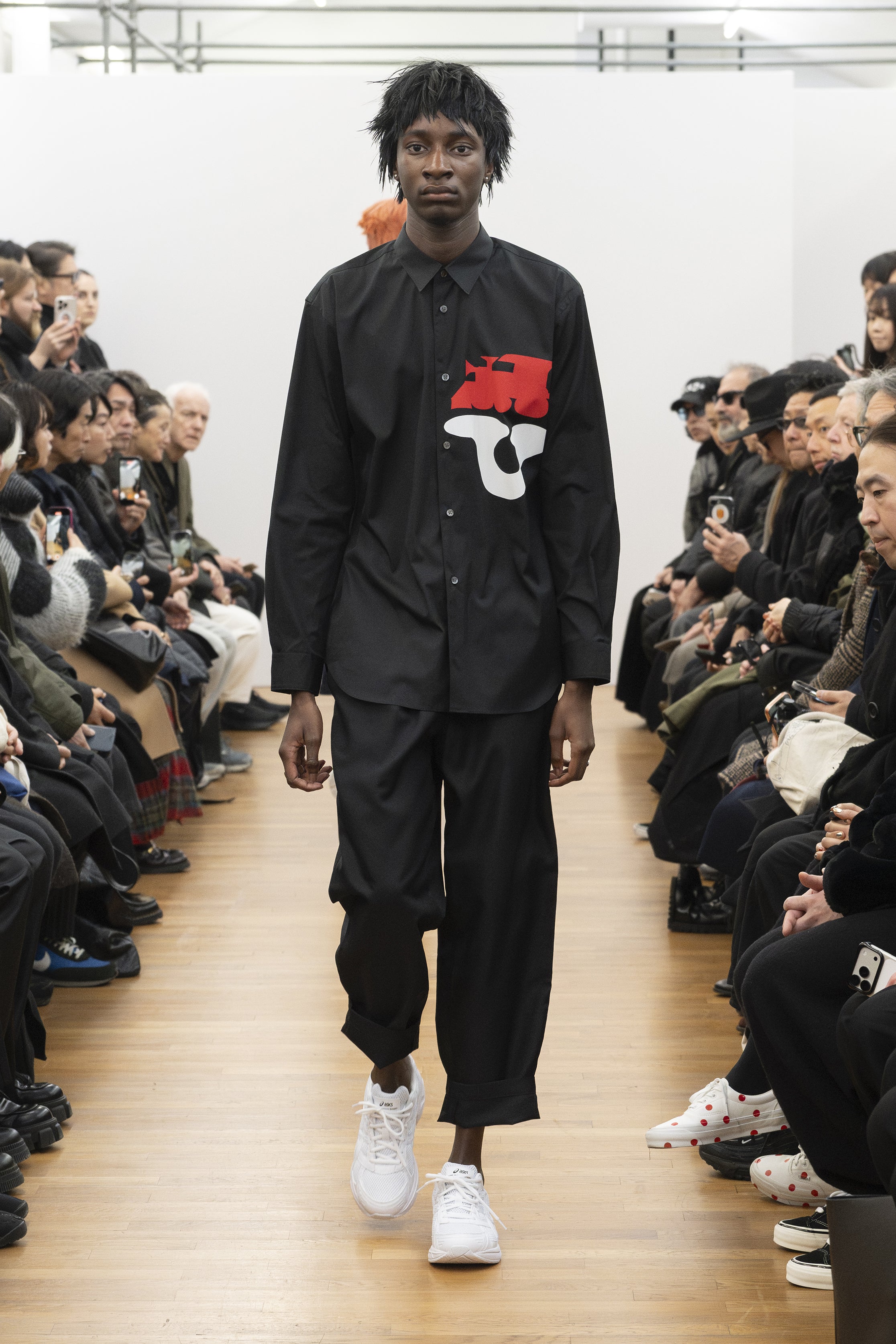 Fashion model wearing a COMME DES GARÇONS SHIRT AW26 outfit