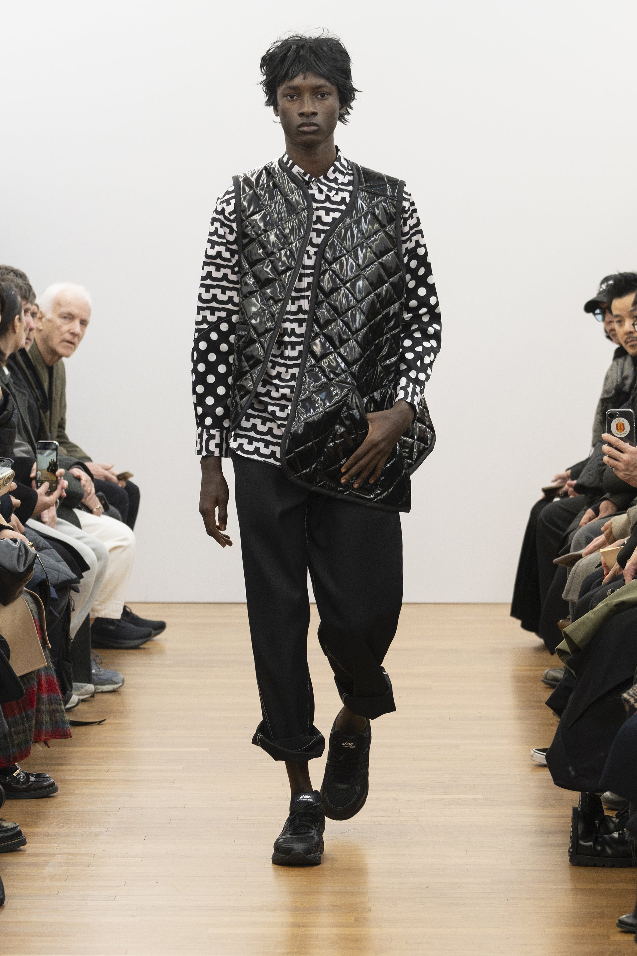Fashion model wearing a COMME DES GARÇONS SHIRT AW26 outfit