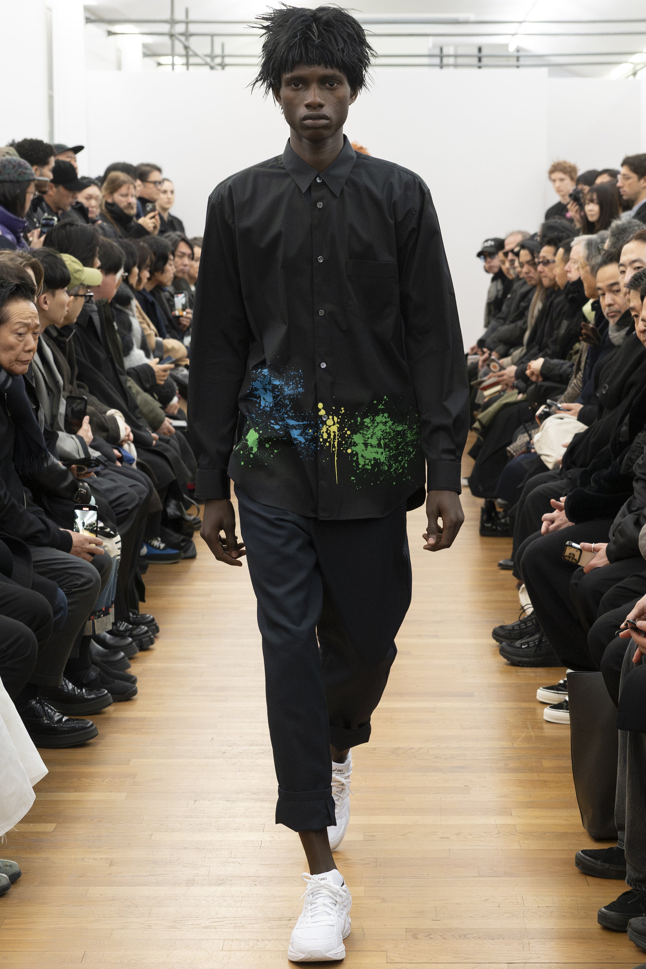 Fashion model wearing a COMME DES GARÇONS SHIRT AW26 outfit