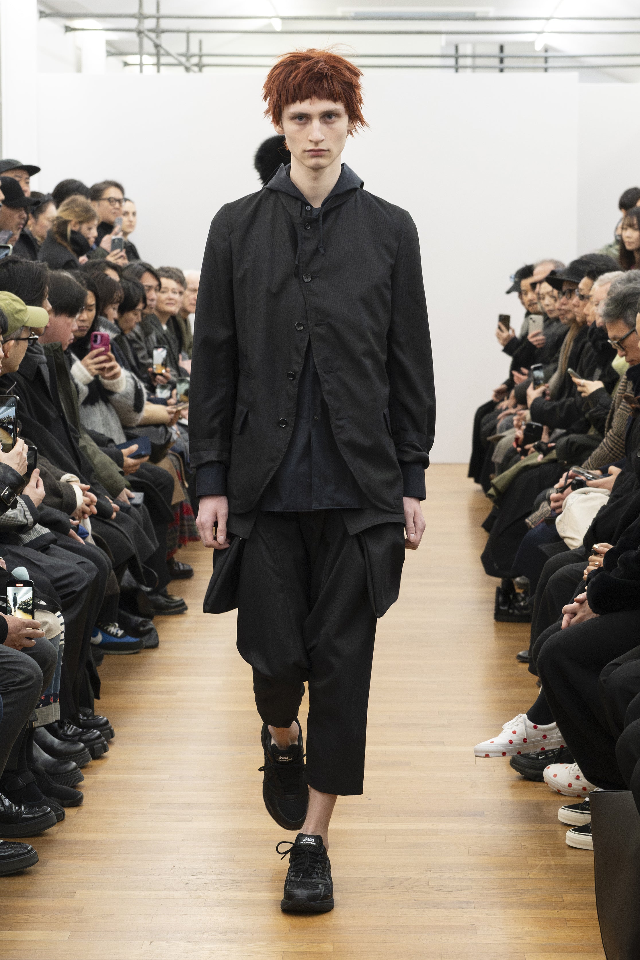 Fashion model wearing a COMME DES GARÇONS SHIRT AW26 outfit