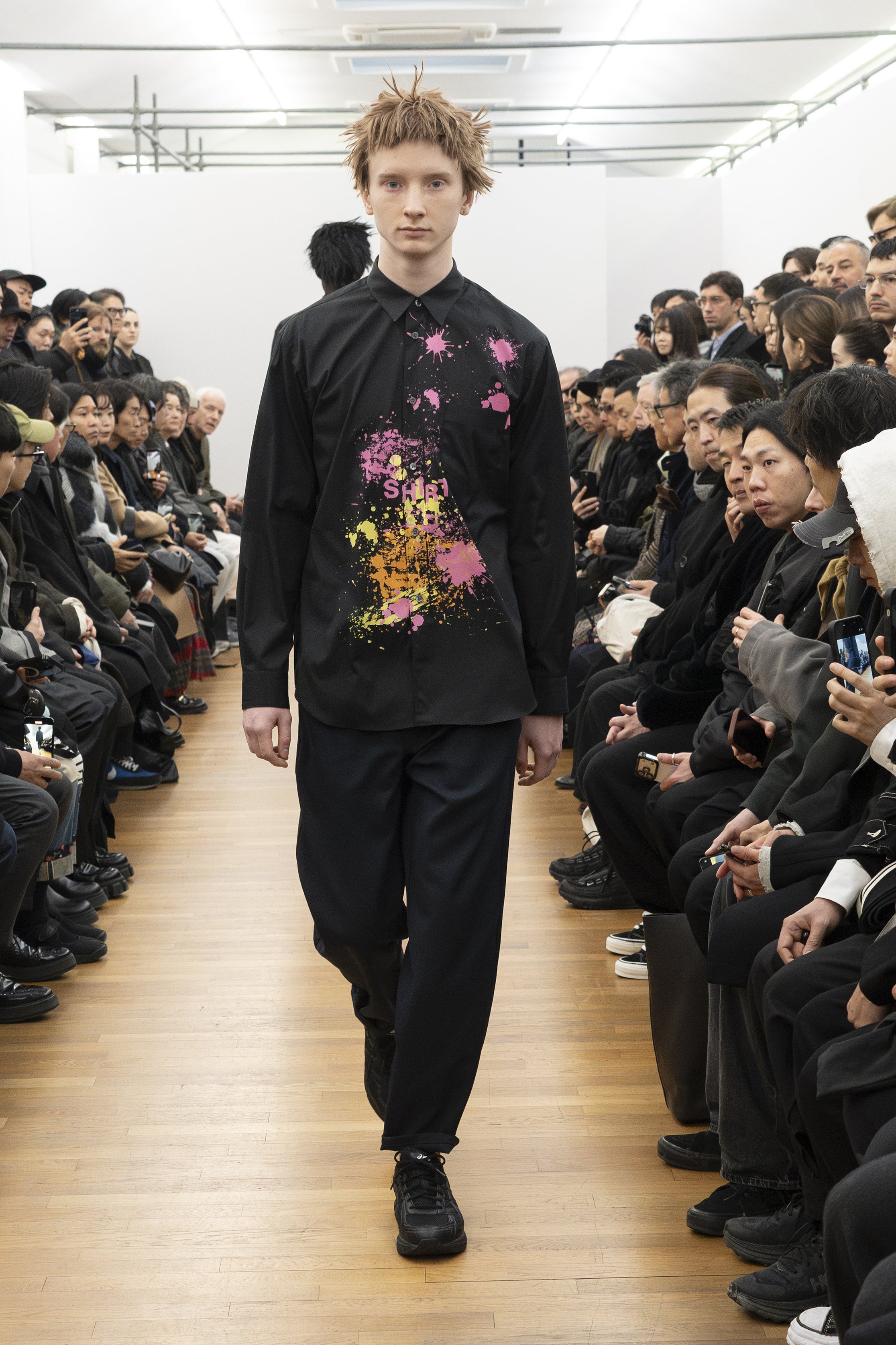 Fashion model wearing a COMME DES GARÇONS SHIRT AW26 outfit