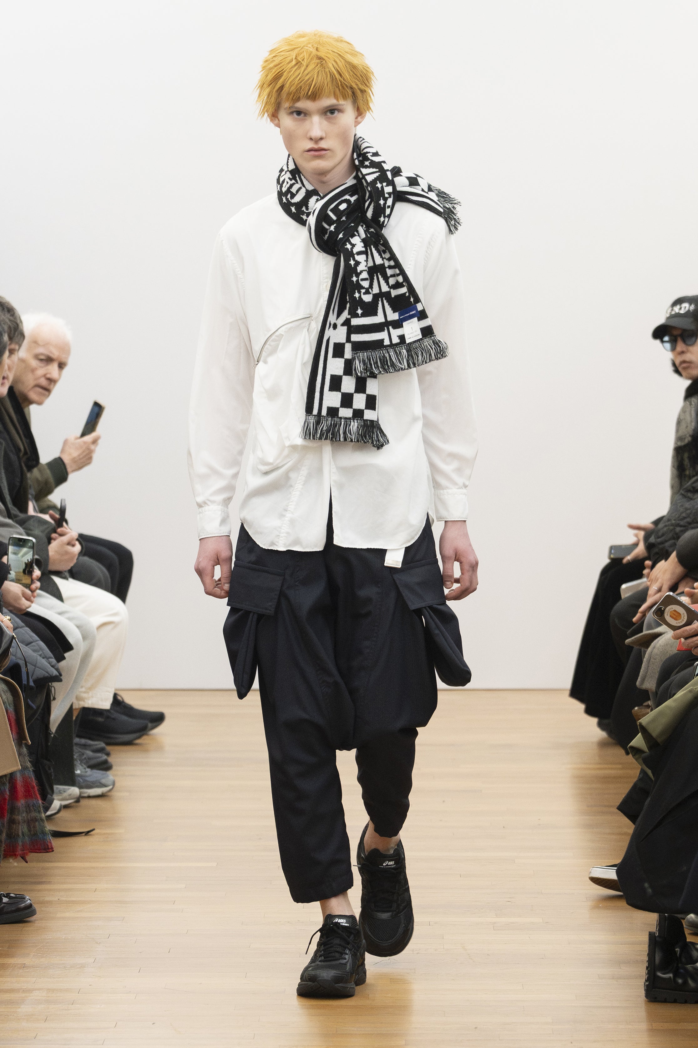 Fashion model wearing a COMME DES GARÇONS SHIRT AW26 outfit