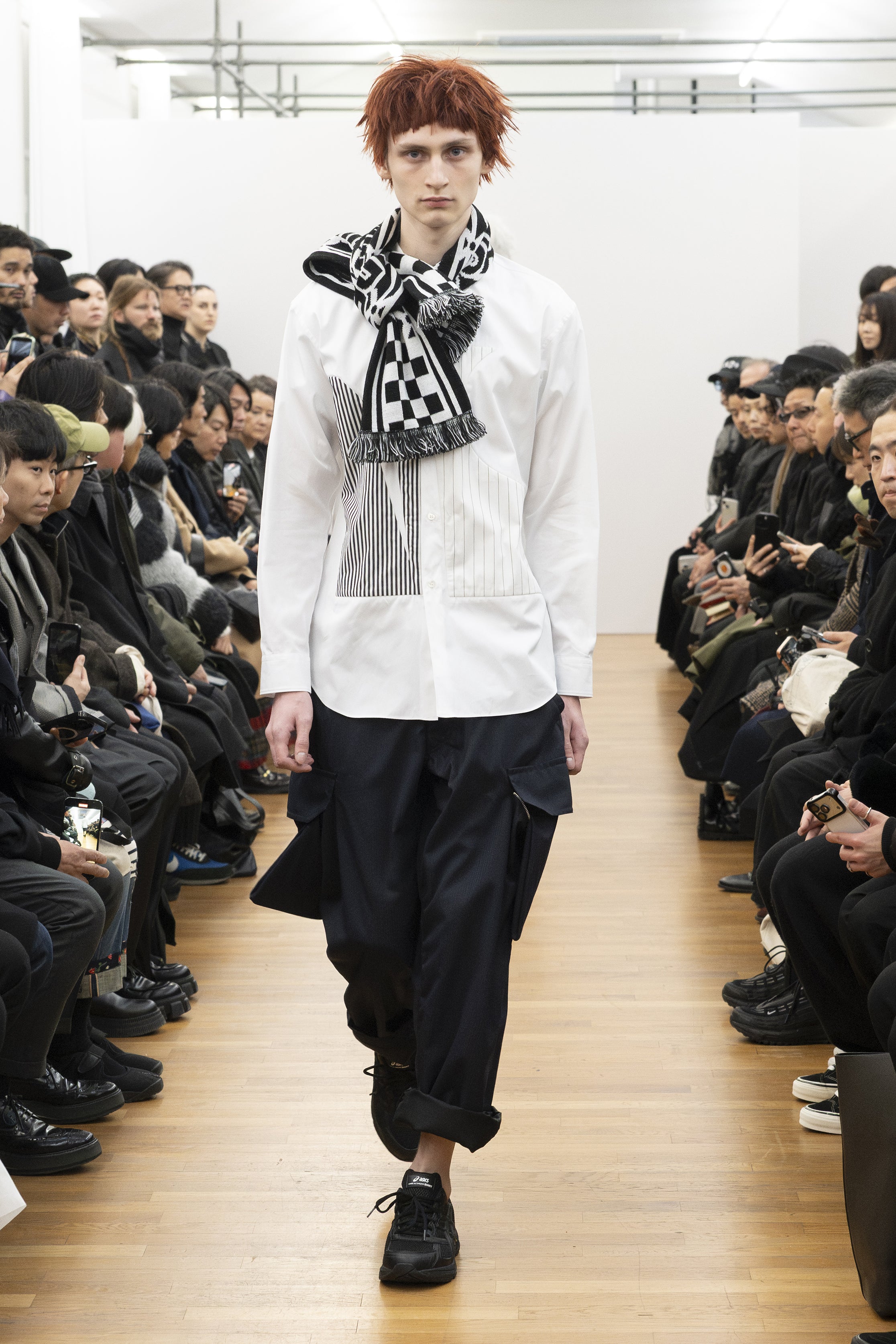Fashion model wearing a COMME DES GARÇONS SHIRT AW26 outfit