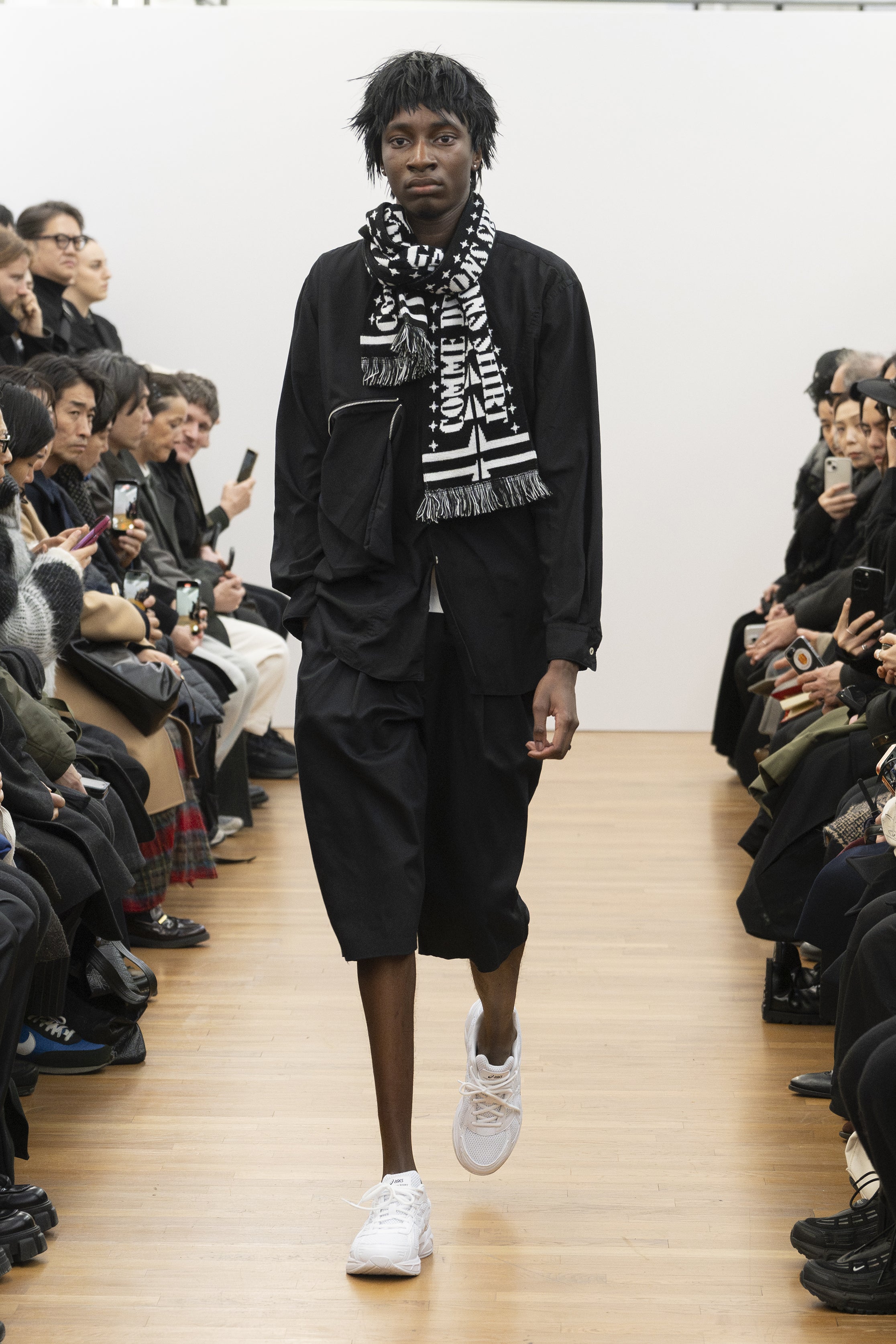 Fashion model wearing a COMME DES GARÇONS SHIRT AW26 outfit
