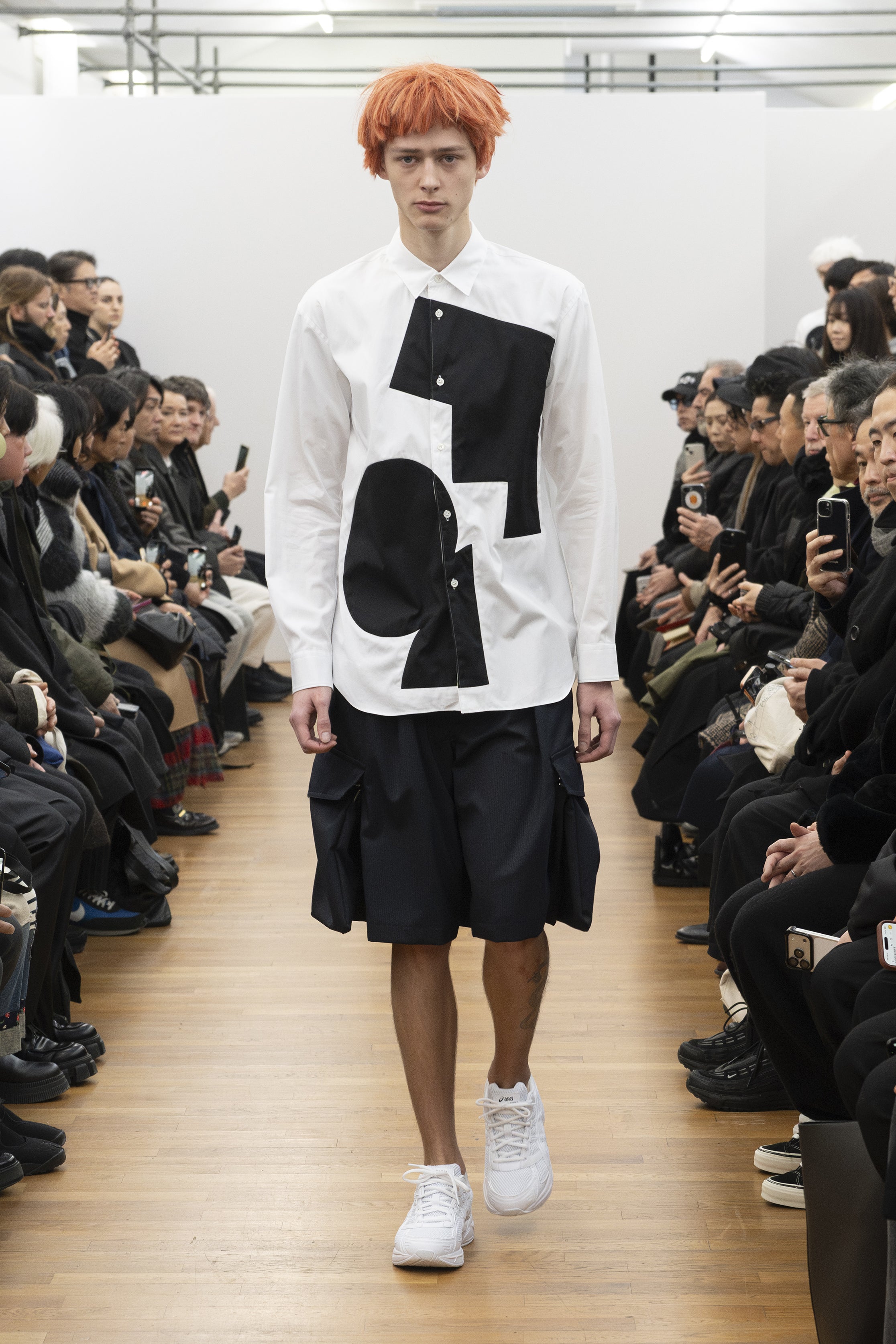 Fashion model wearing a COMME DES GARÇONS SHIRT AW26 outfit