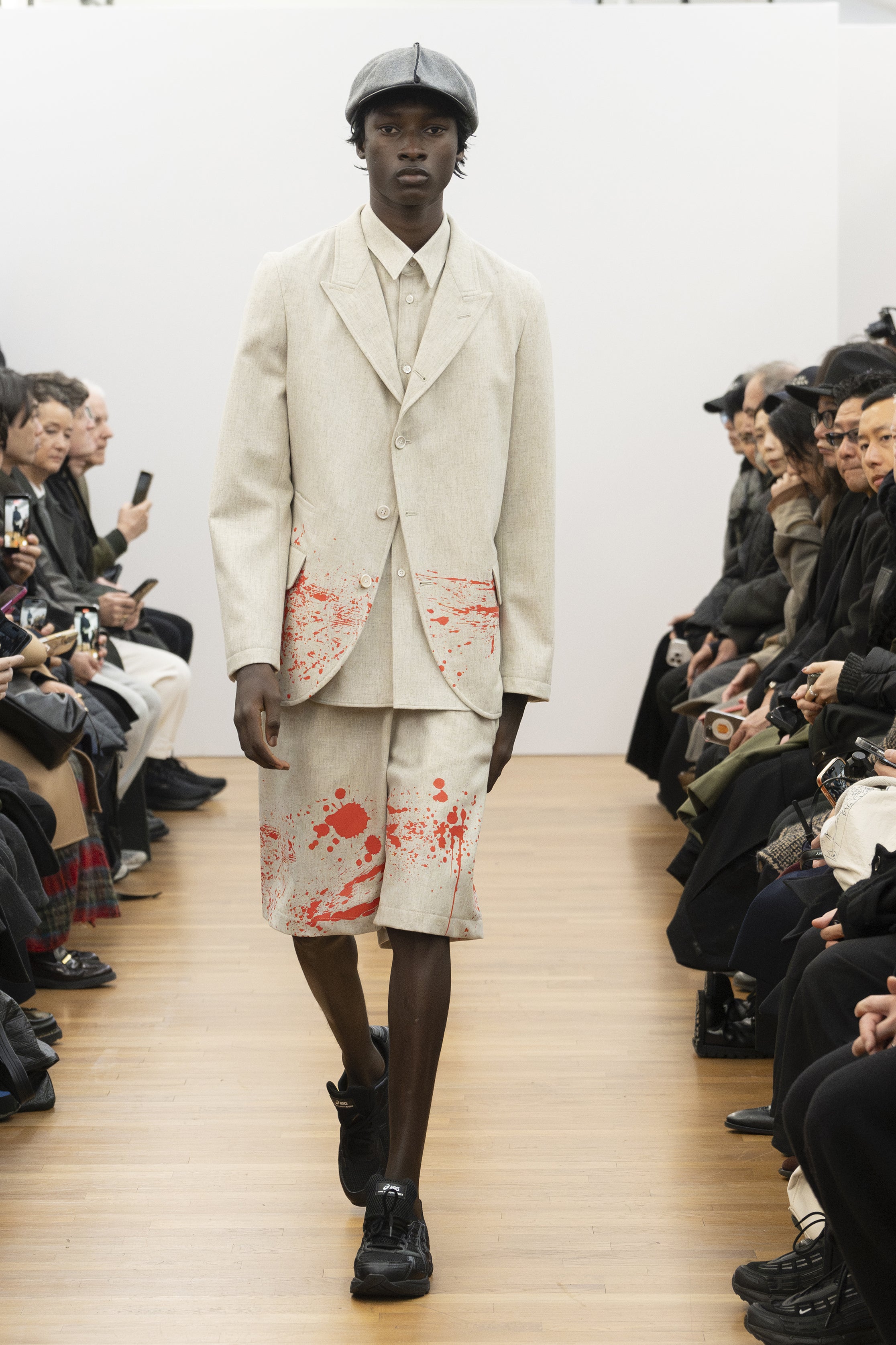 Fashion model wearing a COMME DES GARÇONS SHIRT AW26 outfit