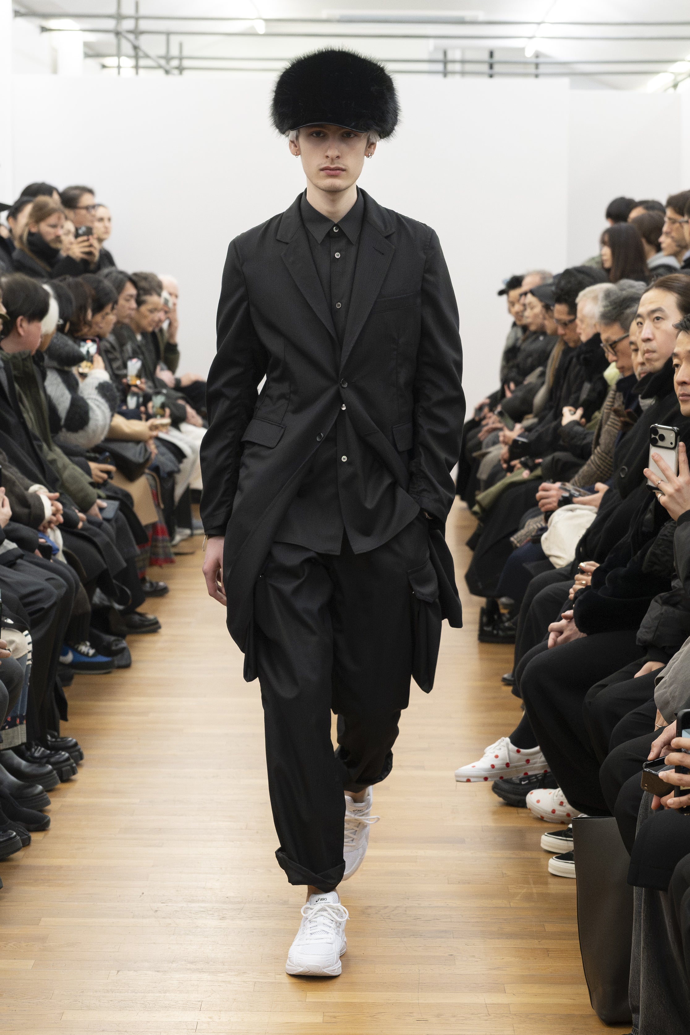 Fashion model wearing a COMME DES GARÇONS SHIRT AW26 outfit