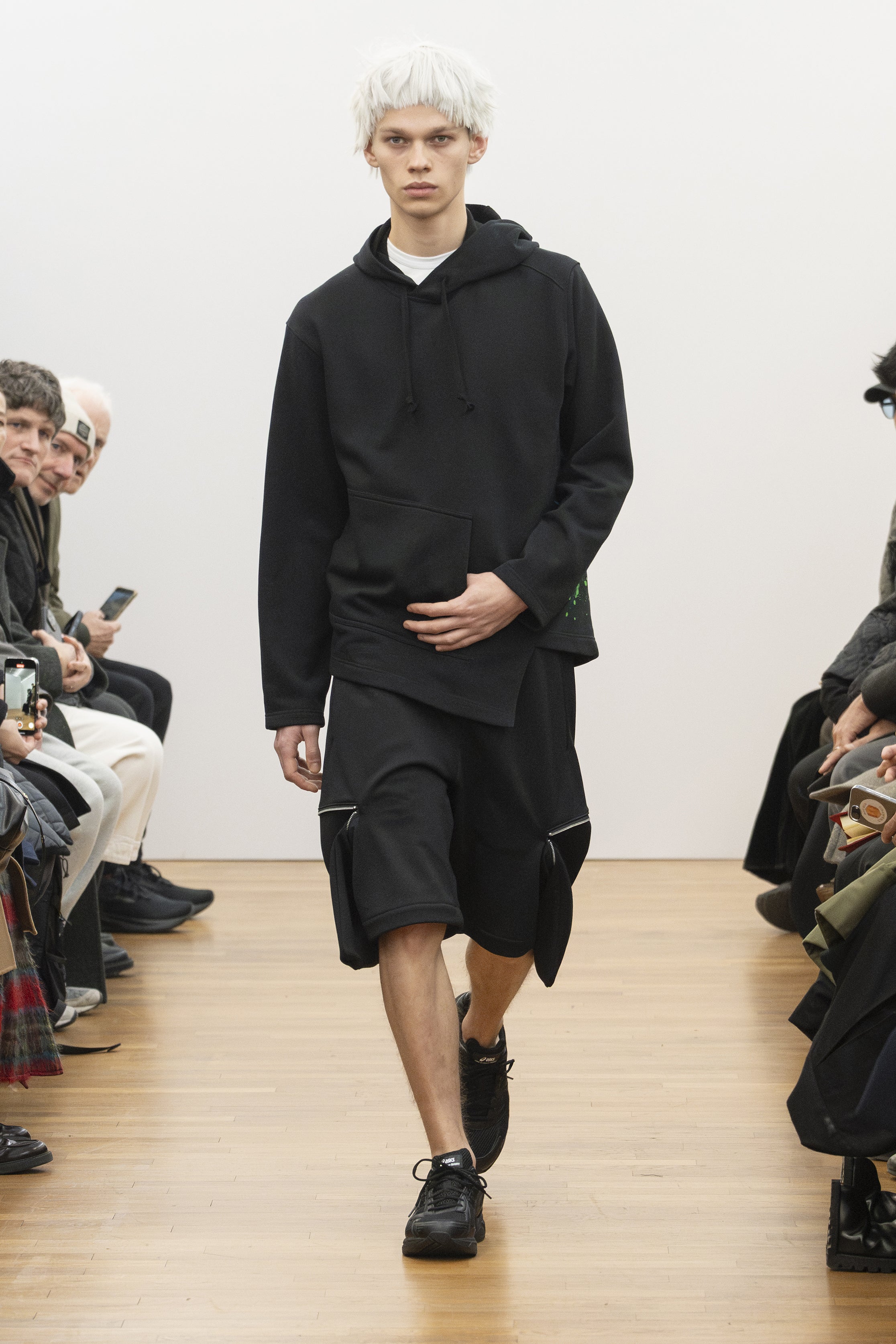 Fashion model wearing a COMME DES GARÇONS SHIRT AW26 outfit