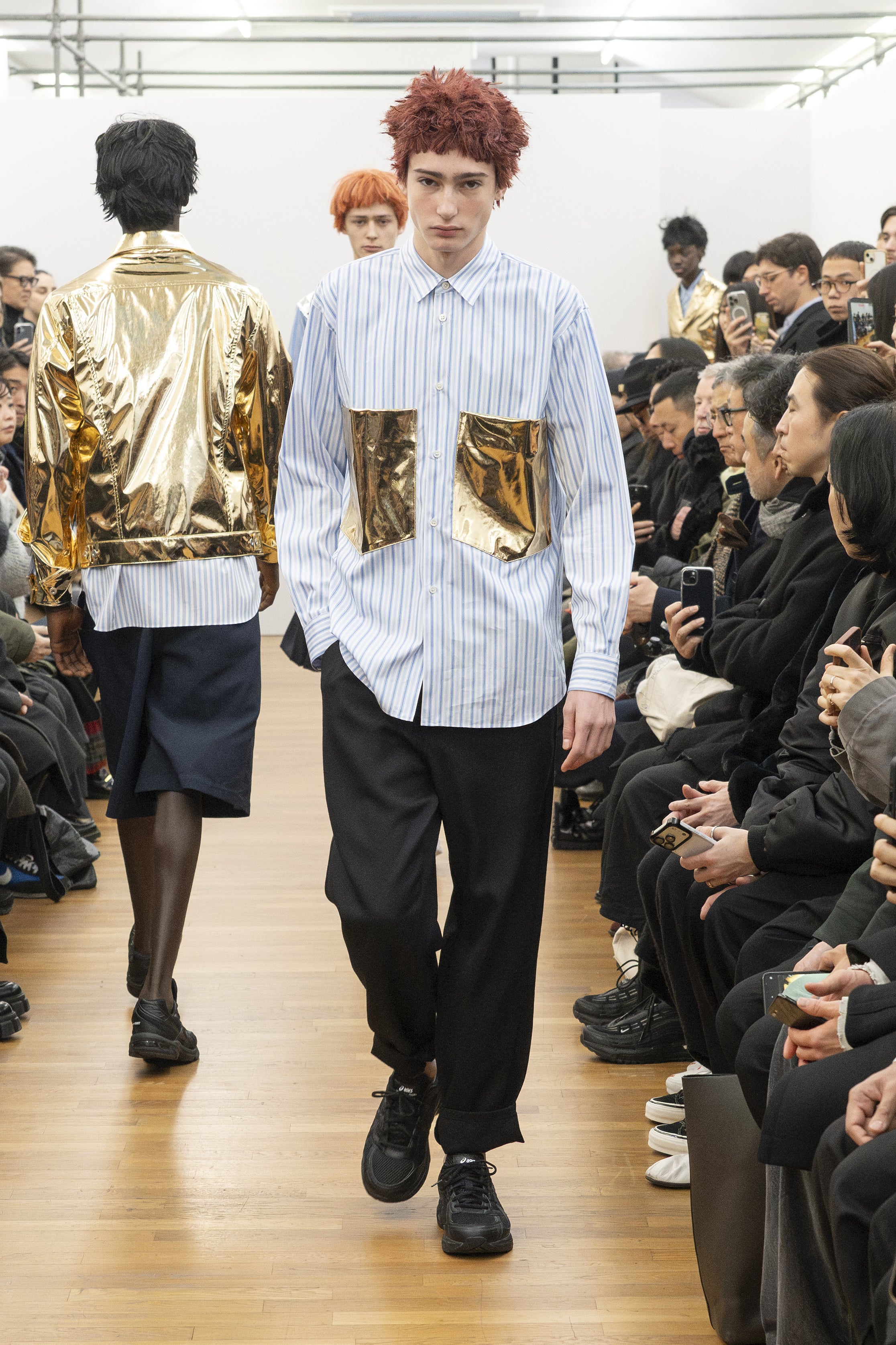 Fashion model wearing a COMME DES GARÇONS SHIRT AW26 outfit