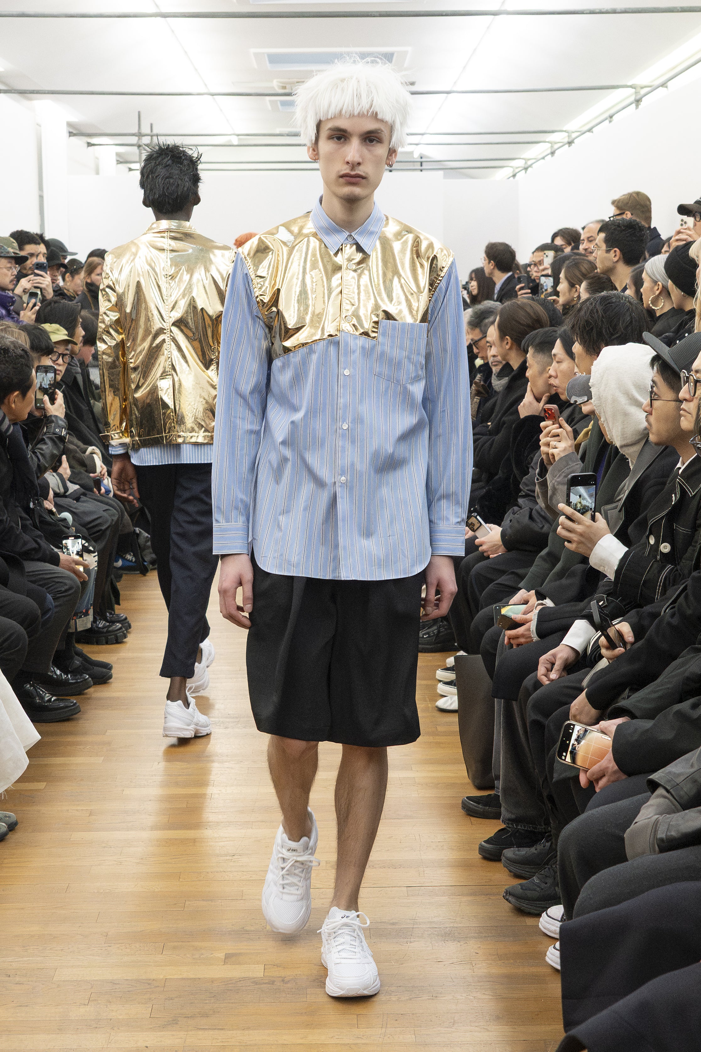Fashion model wearing a COMME DES GARÇONS SHIRT AW26 outfit