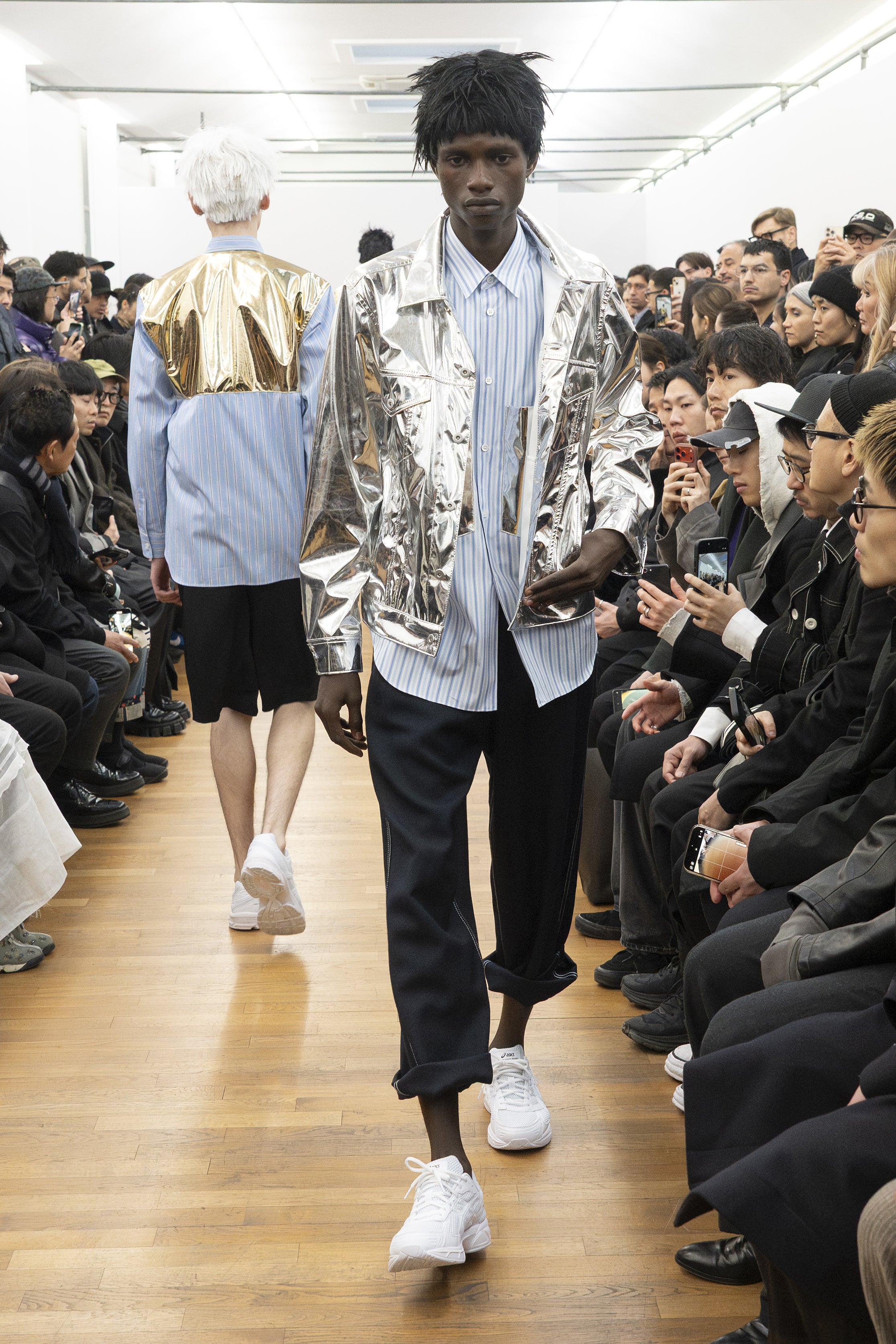 Fashion model wearing a COMME DES GARÇONS SHIRT AW26 outfit