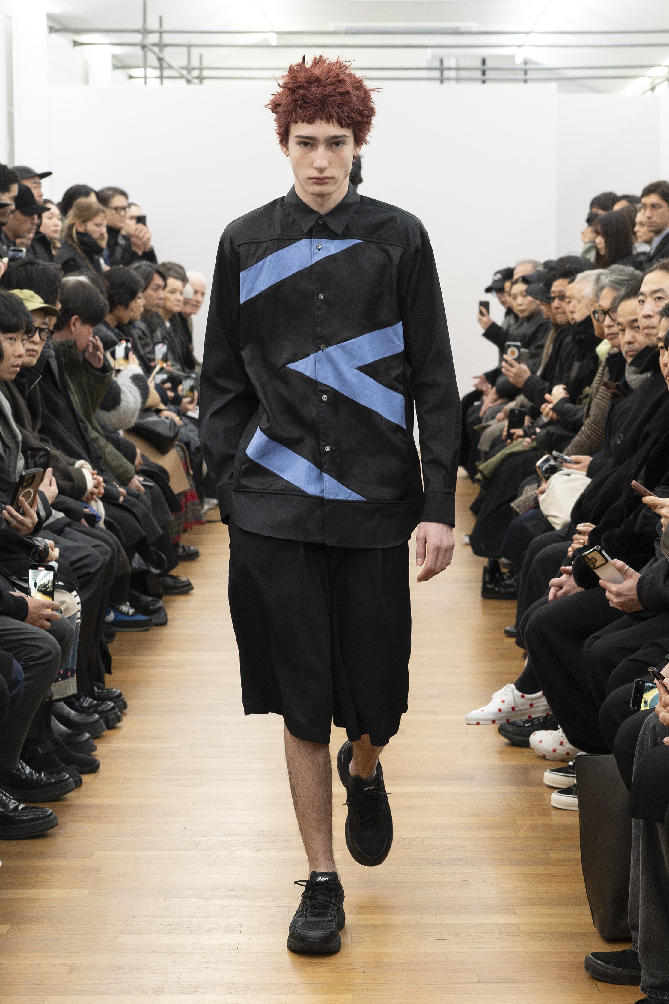 Fashion model wearing a COMME DES GARÇONS SHIRT AW26 outfit