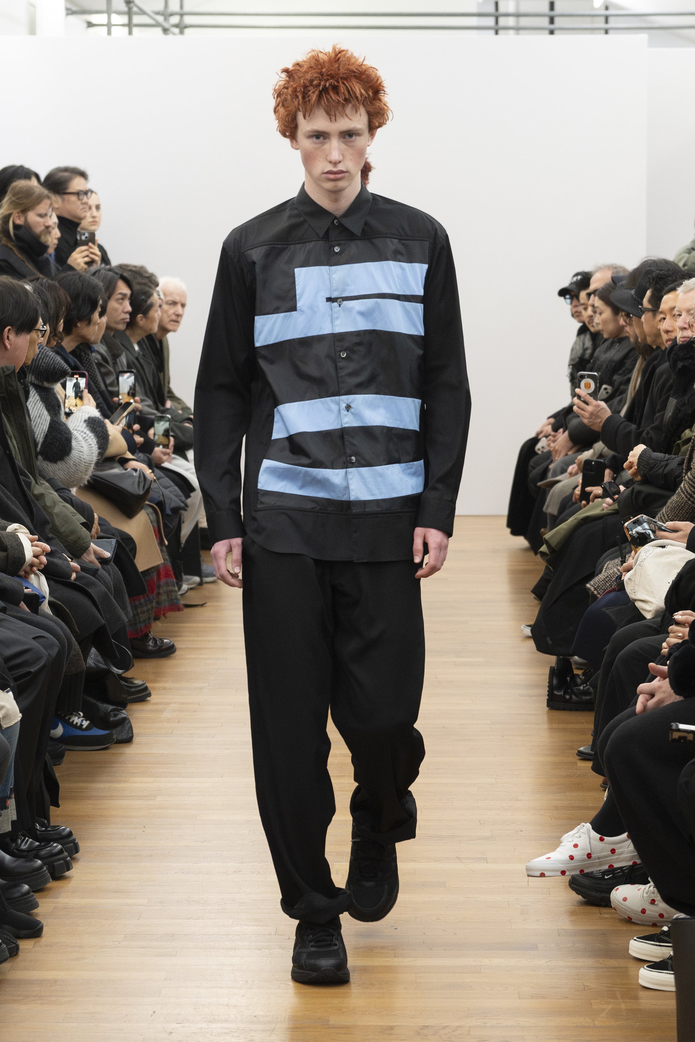 Fashion model wearing a COMME DES GARÇONS SHIRT AW26 outfit