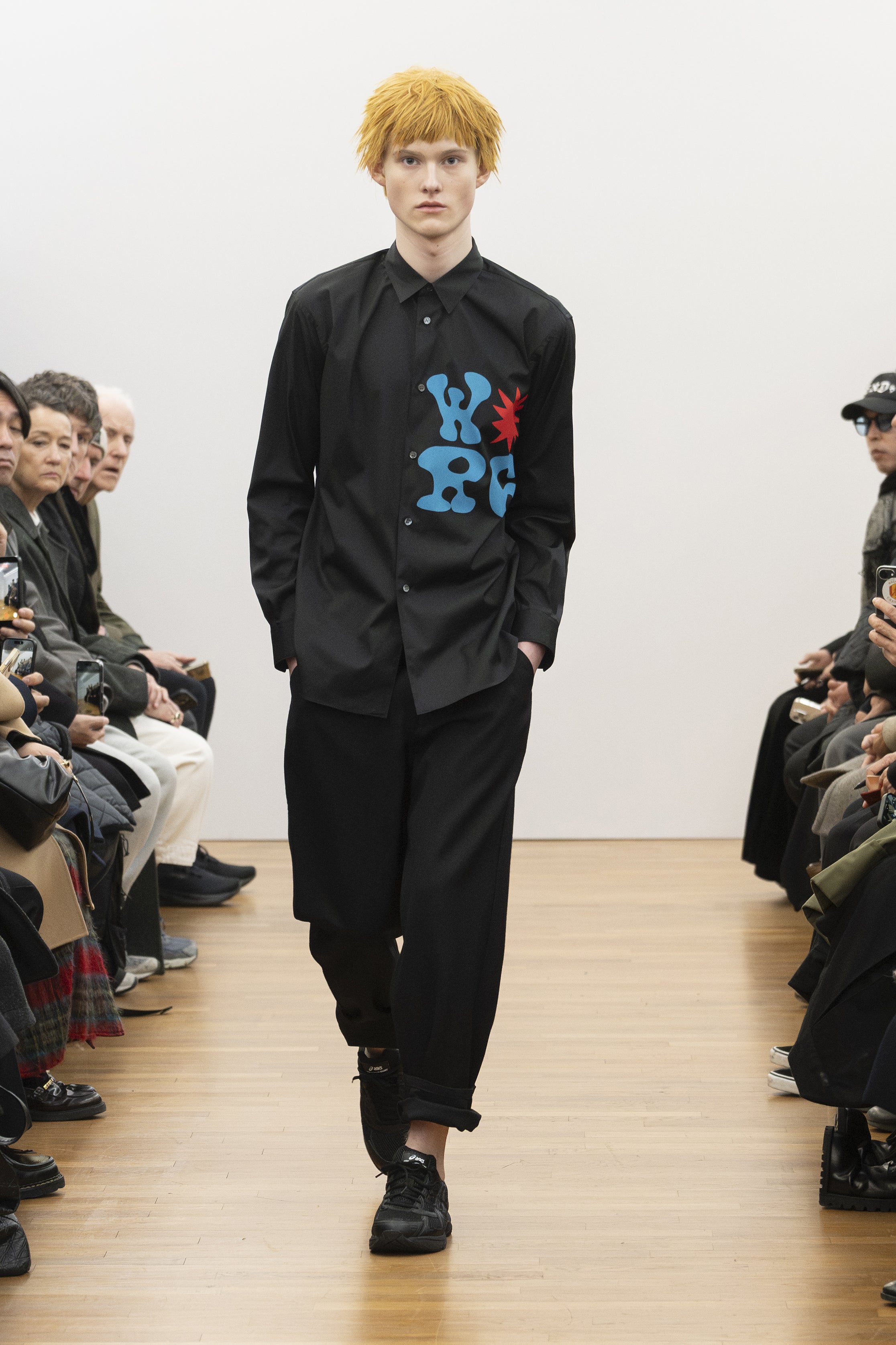 Fashion model wearing a COMME DES GARÇONS SHIRT AW26 outfit
