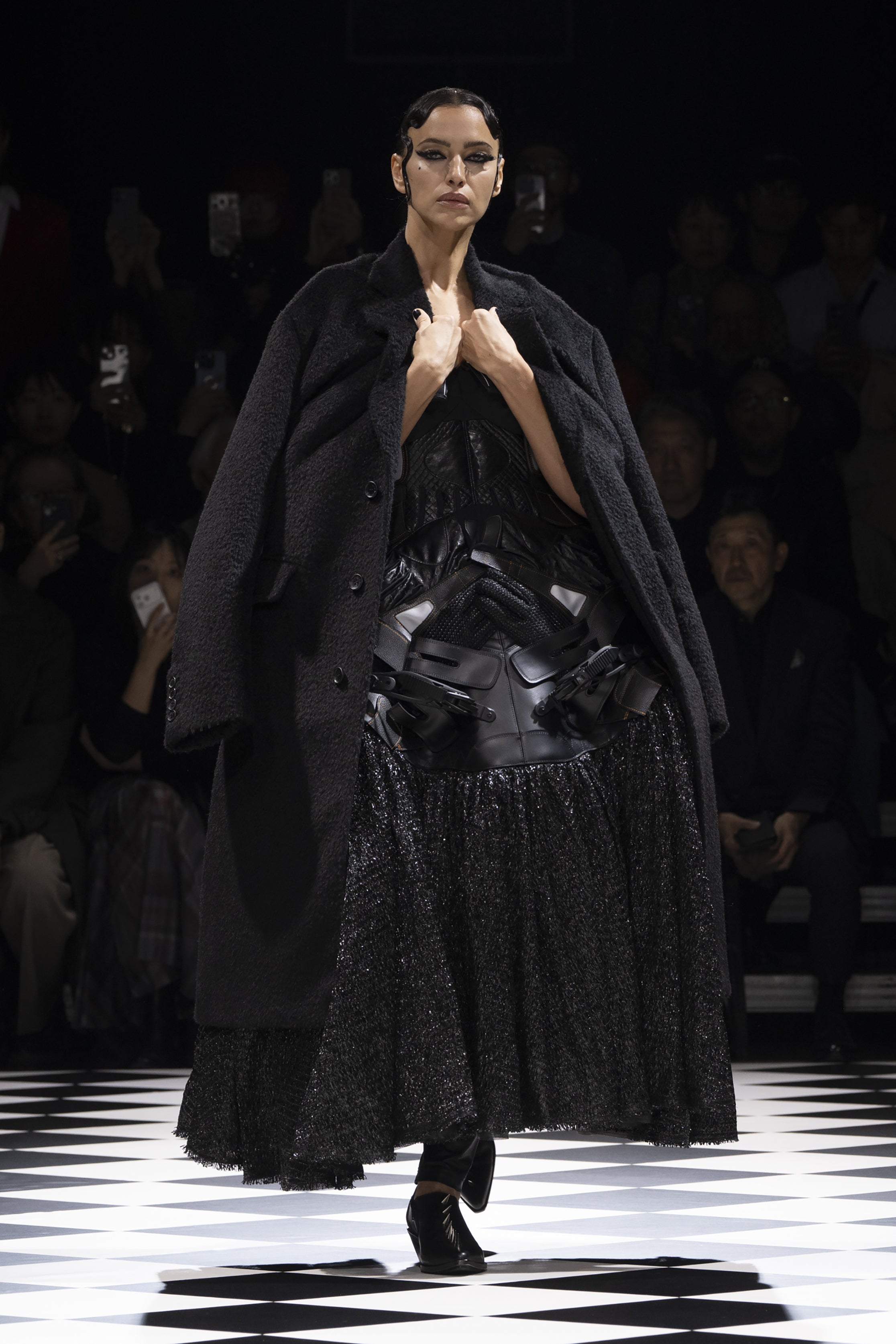 Fashion model wearing a JUNYA WATANABE AW26 outfit