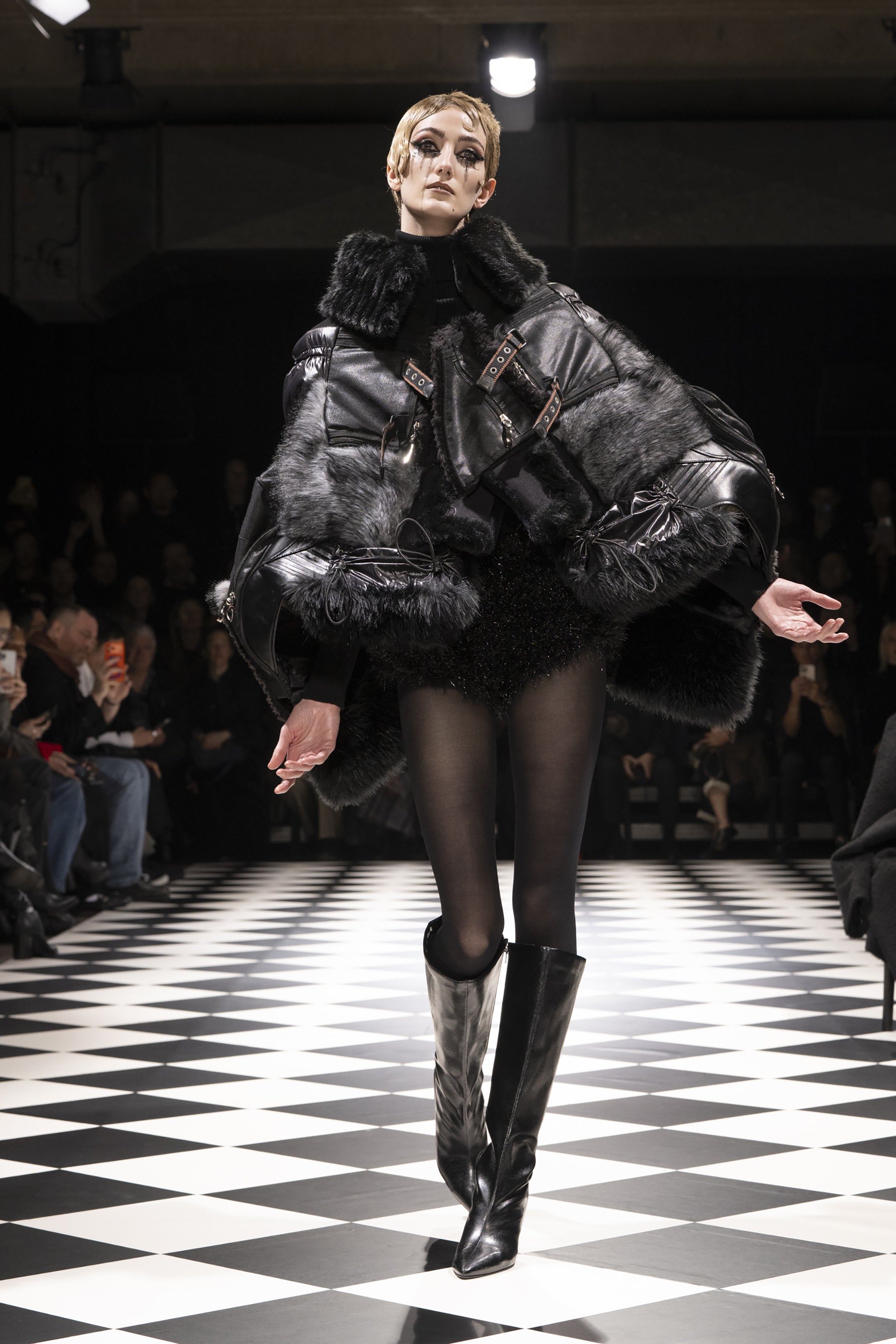 Fashion model wearing a JUNYA WATANABE AW26 outfit