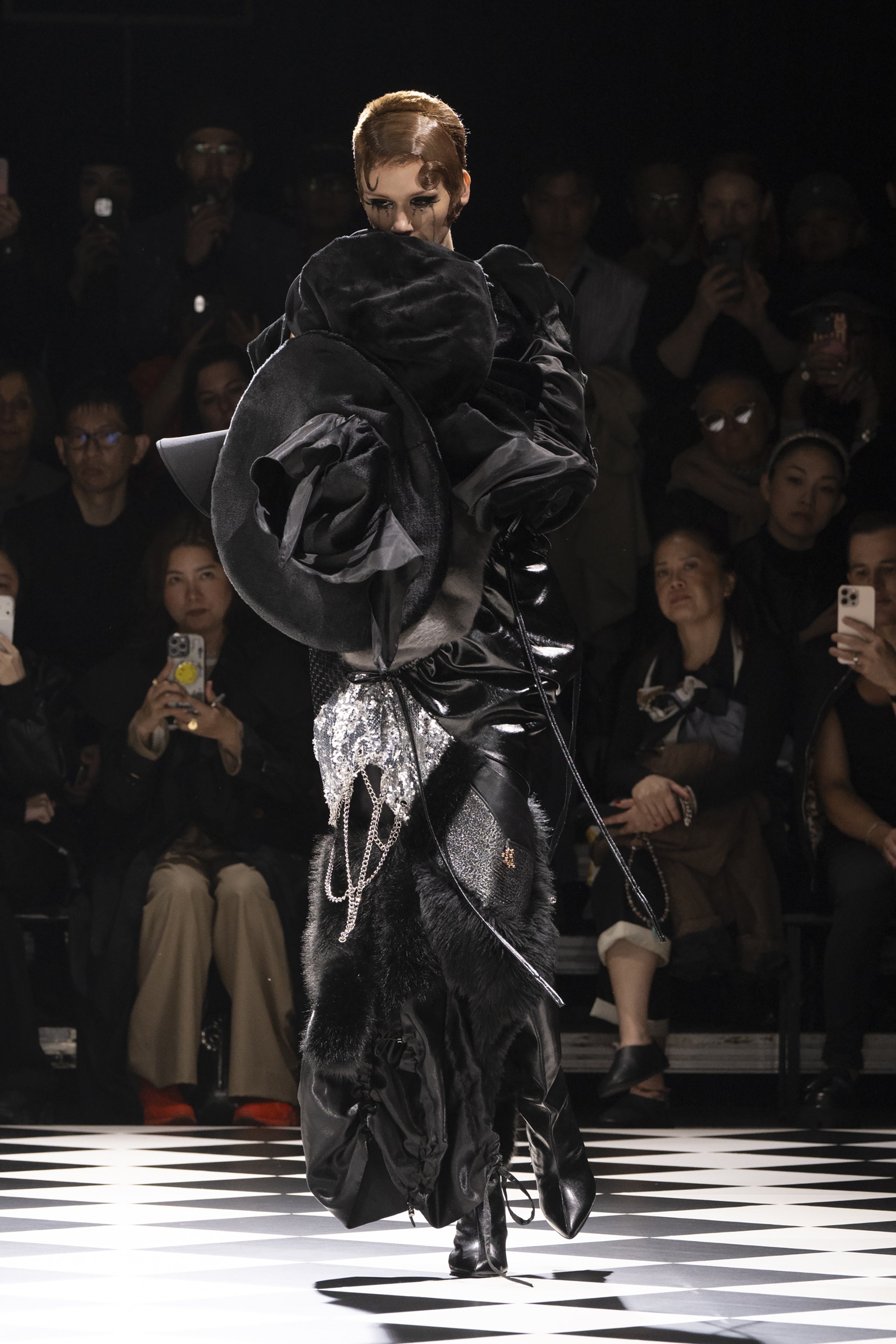 Fashion model wearing a JUNYA WATANABE AW26 outfit