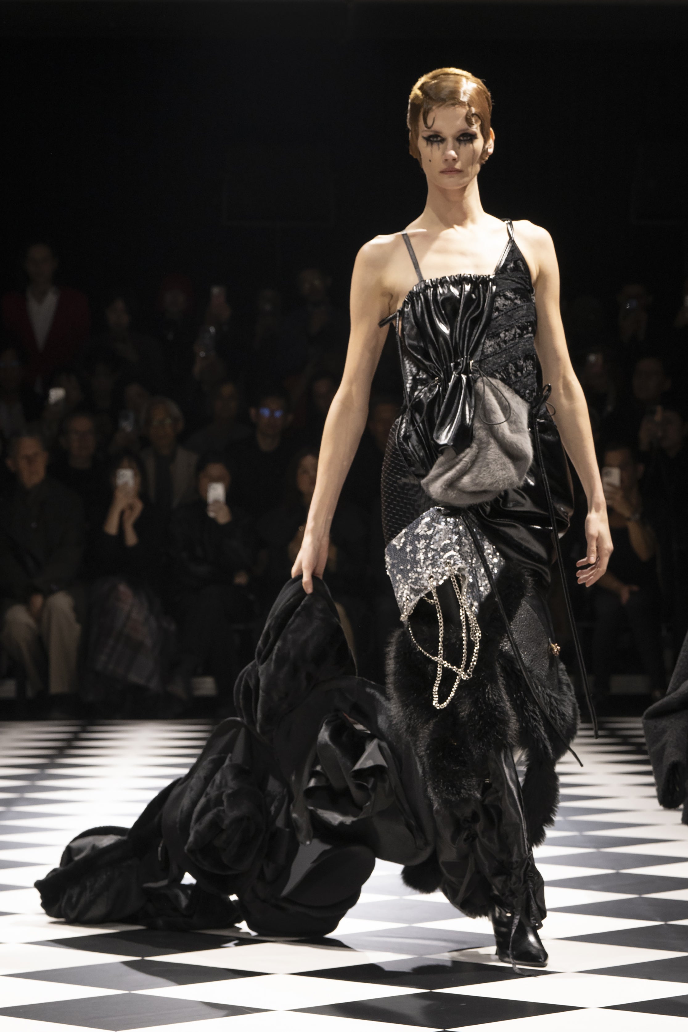 Fashion model wearing a JUNYA WATANABE AW26 outfit
