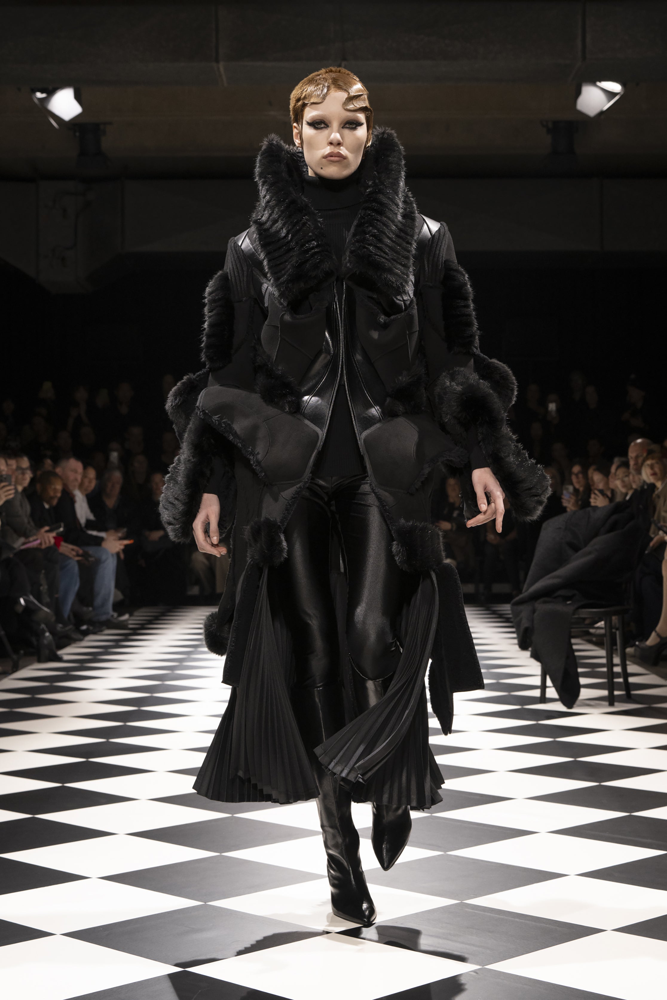 Fashion model wearing a JUNYA WATANABE AW26 outfit