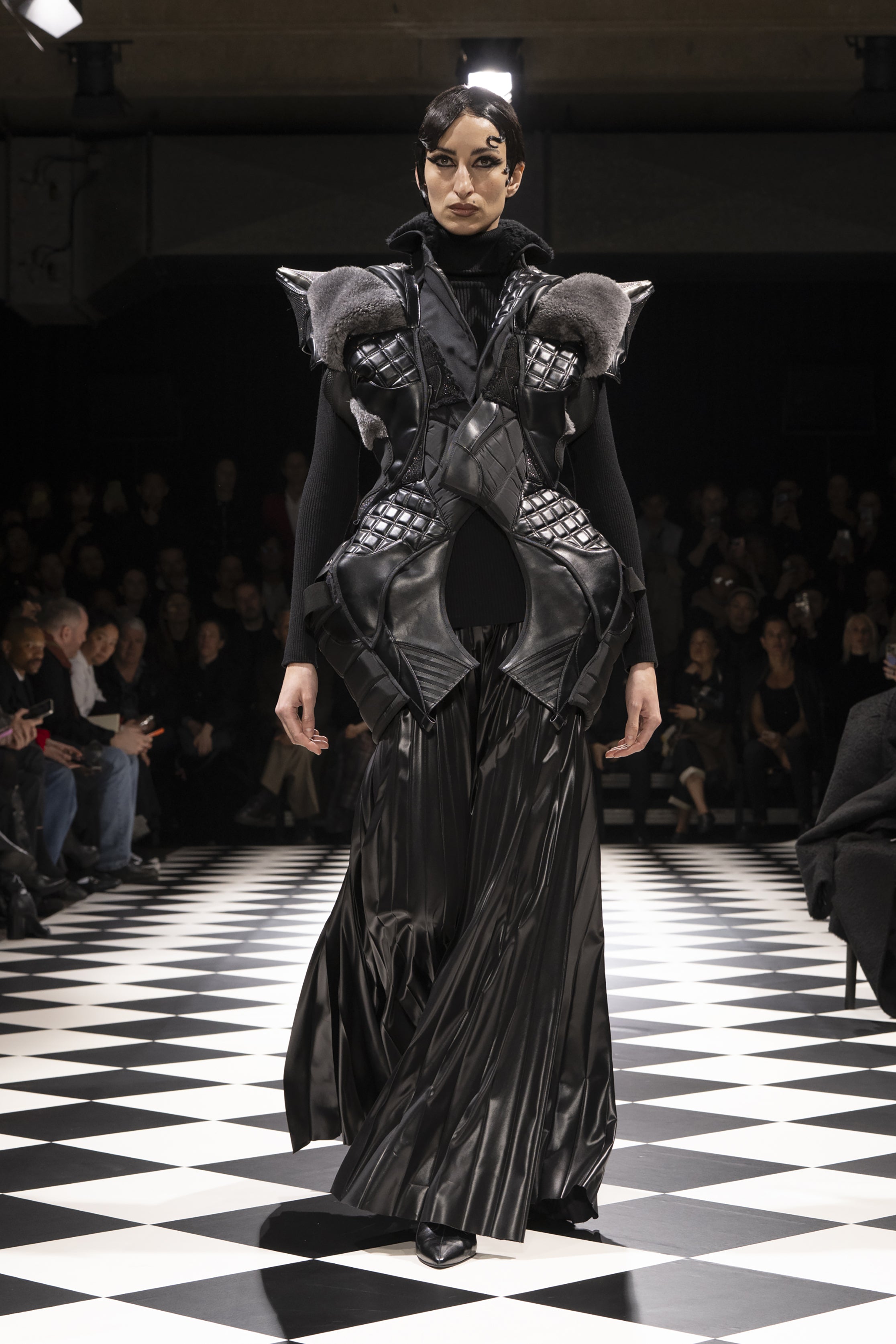 Fashion model wearing a JUNYA WATANABE AW26 outfit