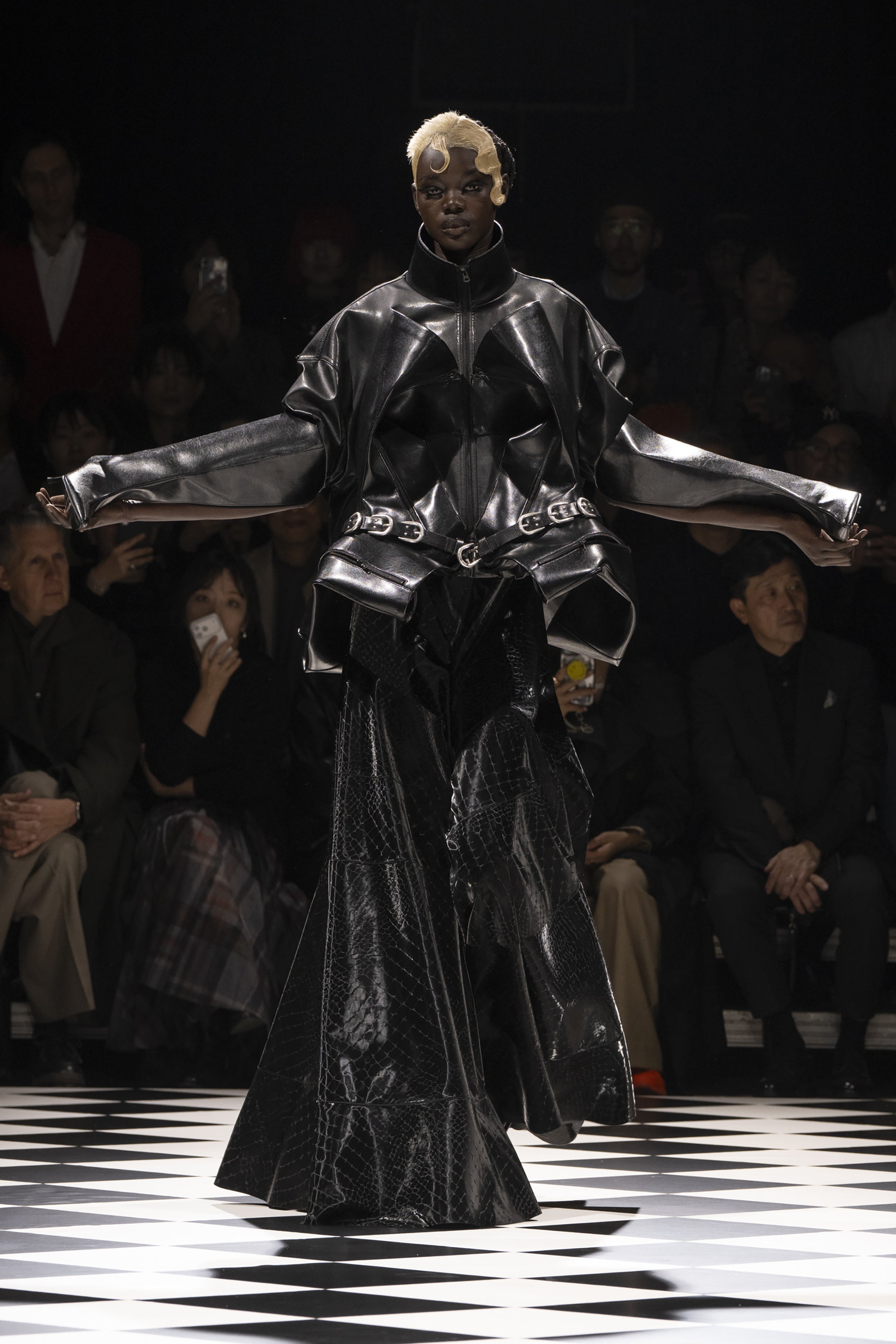 Fashion model wearing a JUNYA WATANABE AW26 outfit