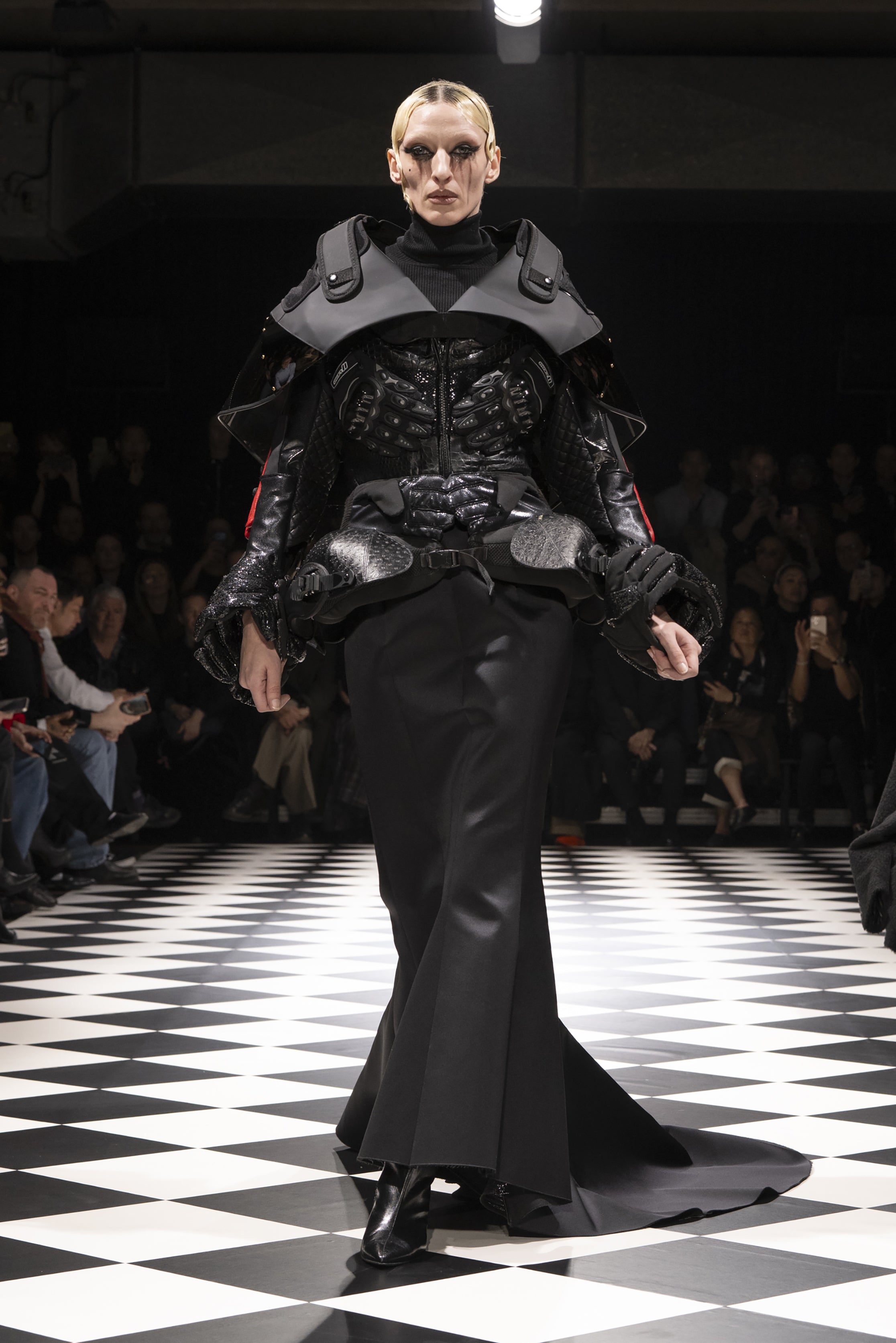 Fashion model wearing a JUNYA WATANABE AW26 outfit
