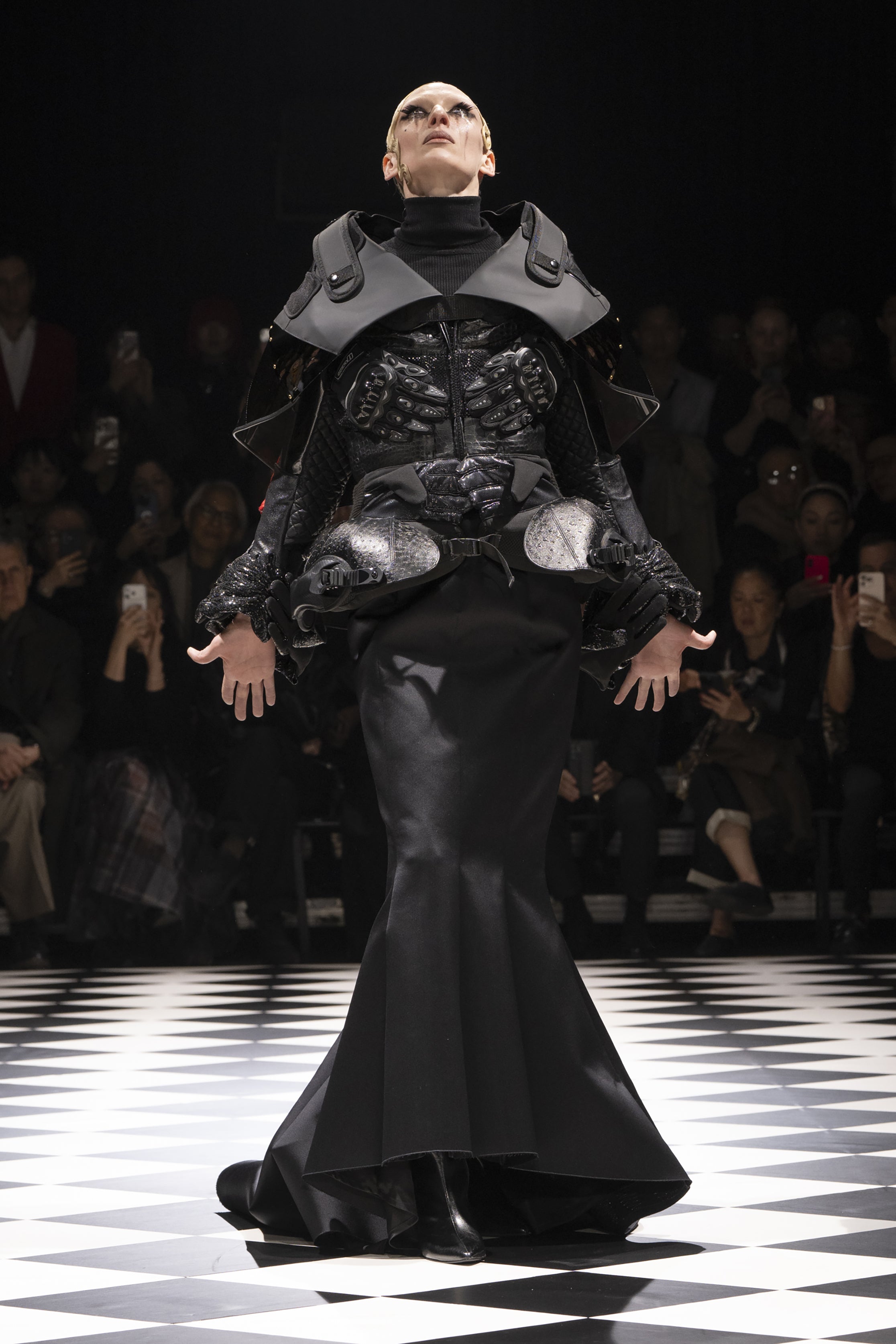 Fashion model wearing a JUNYA WATANABE AW26 outfit