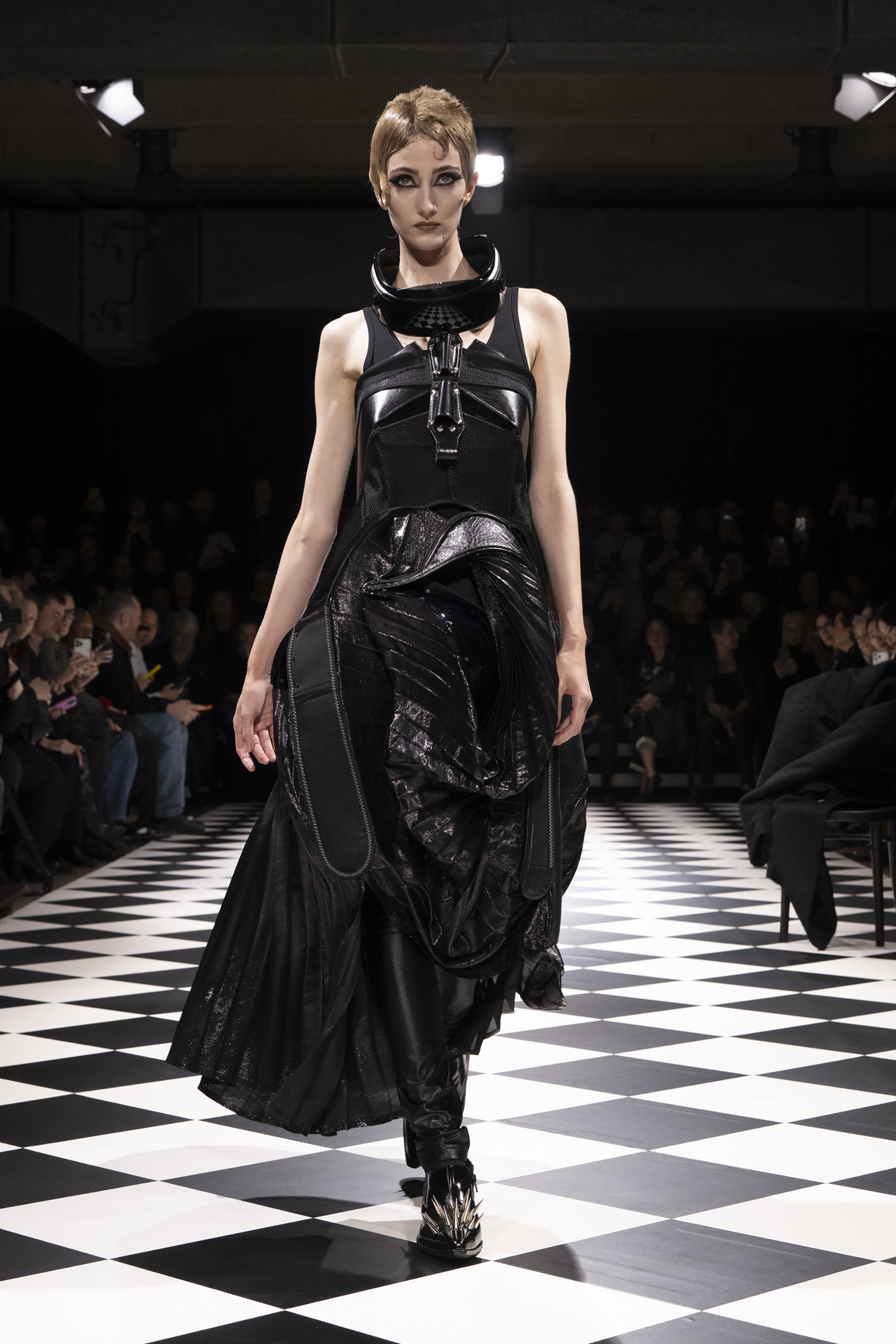 Fashion model wearing a JUNYA WATANABE AW26 outfit